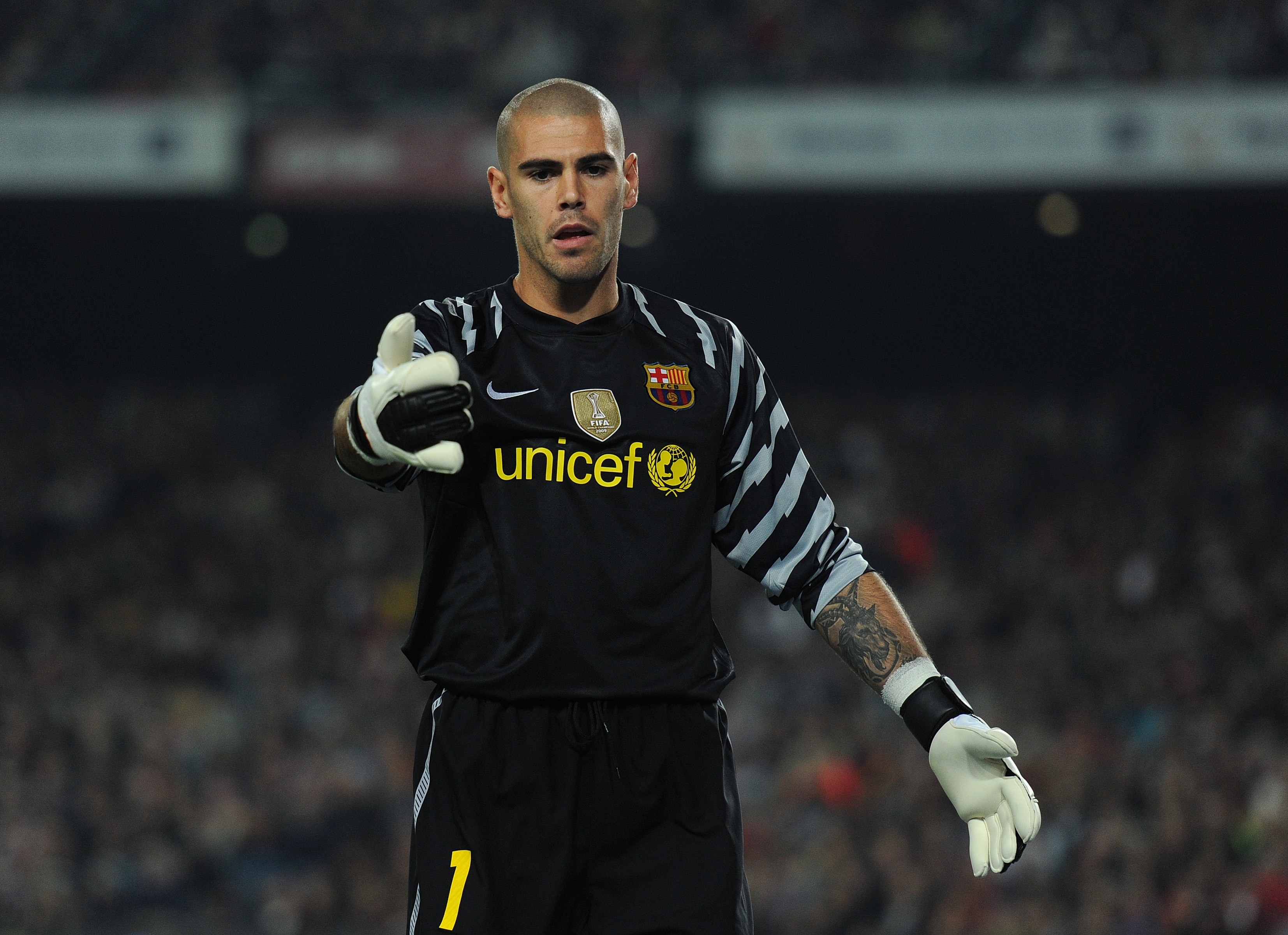 BARCELONA, SPAIN - OCTOBER 16:  Goalkeeper Victor Valdes of Barcelona gestures during the La Liga match between Barcelona and Valencia at the Camp Nou stadium on October 16, 2010 in Barcelona, Spain. Barcelona won the match 2-1.  (Photo by Jasper Juinen/G