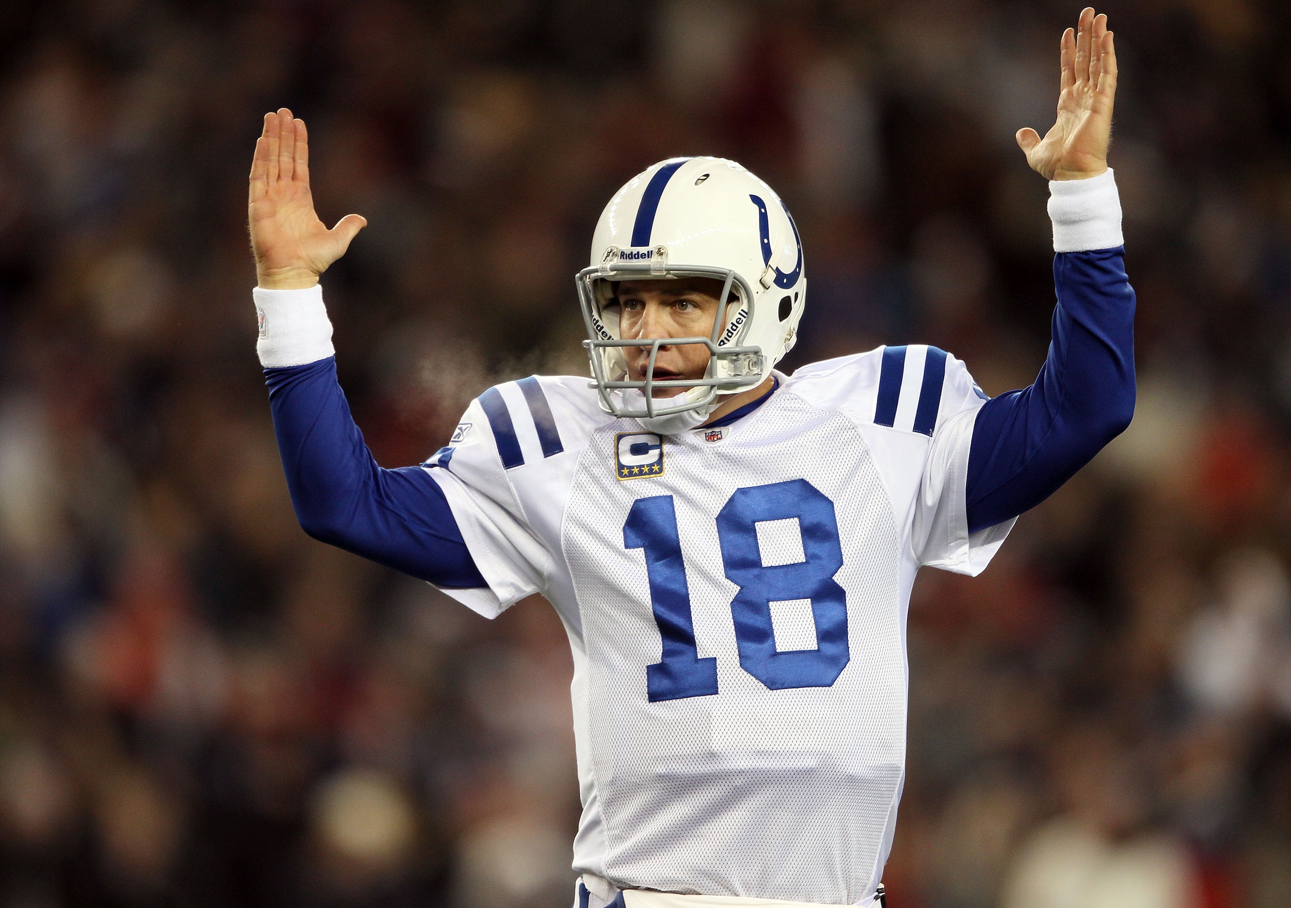 FOXBORO, MA - NOVEMBER 21:  Peyton Manning #18 of the Indianapolis Colts celebrates a touchdown in the fourth quarter against the New England Patriots on November 21, 2010 at Gillette Stadium in Foxboro, Massachusetts. The Patriots defeated the Colts 31-2
