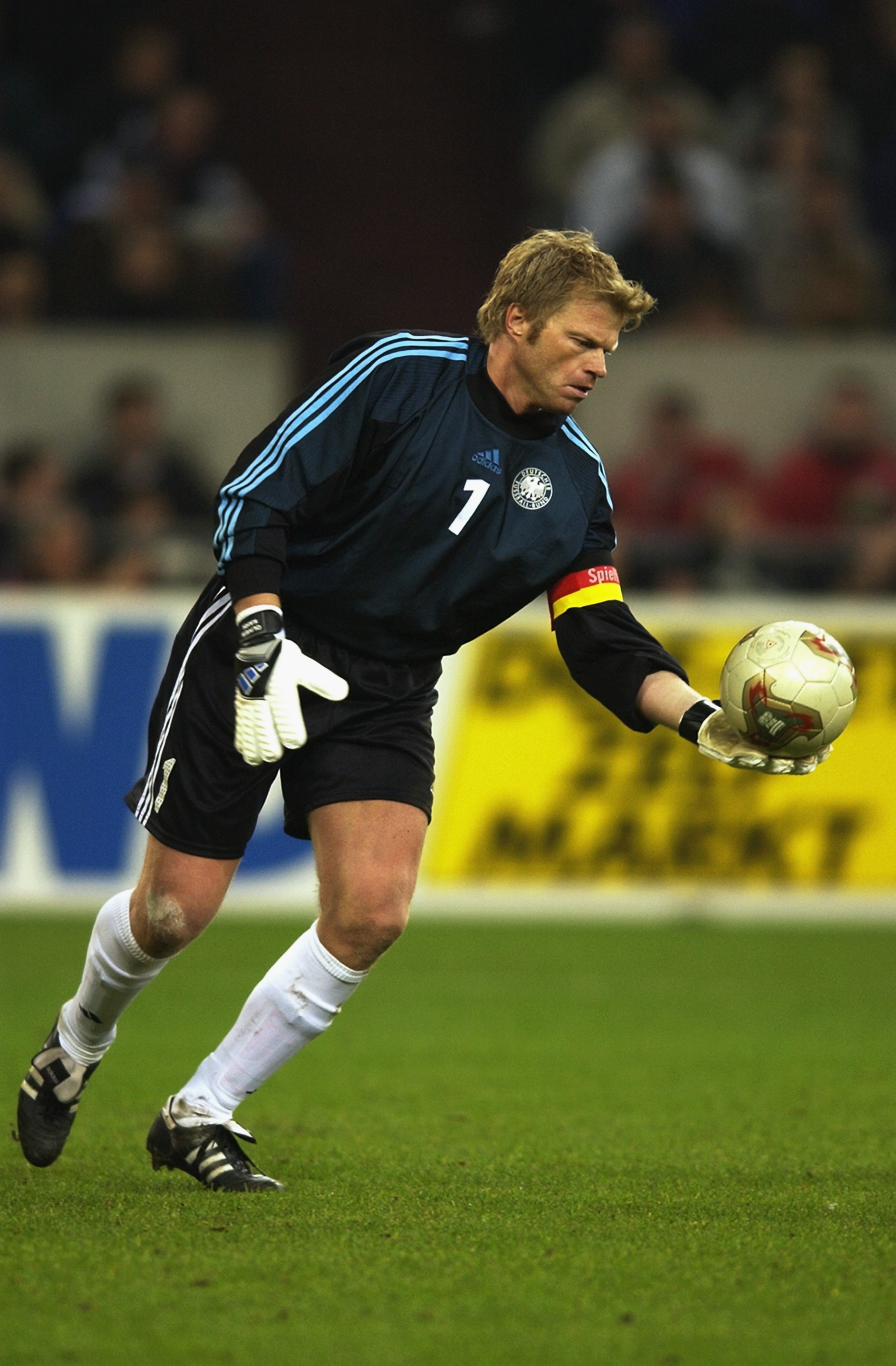 GELSENKIRCHEN- NOVEMBER 20:  Oliver Kahn of Germany with the ball in his hand preparing to kick it during the international friendly between Germany and Holland held on November 20, 2002 at The Auf Schalke Arena, Gelsenkirchen, Germany.  Holland won the m