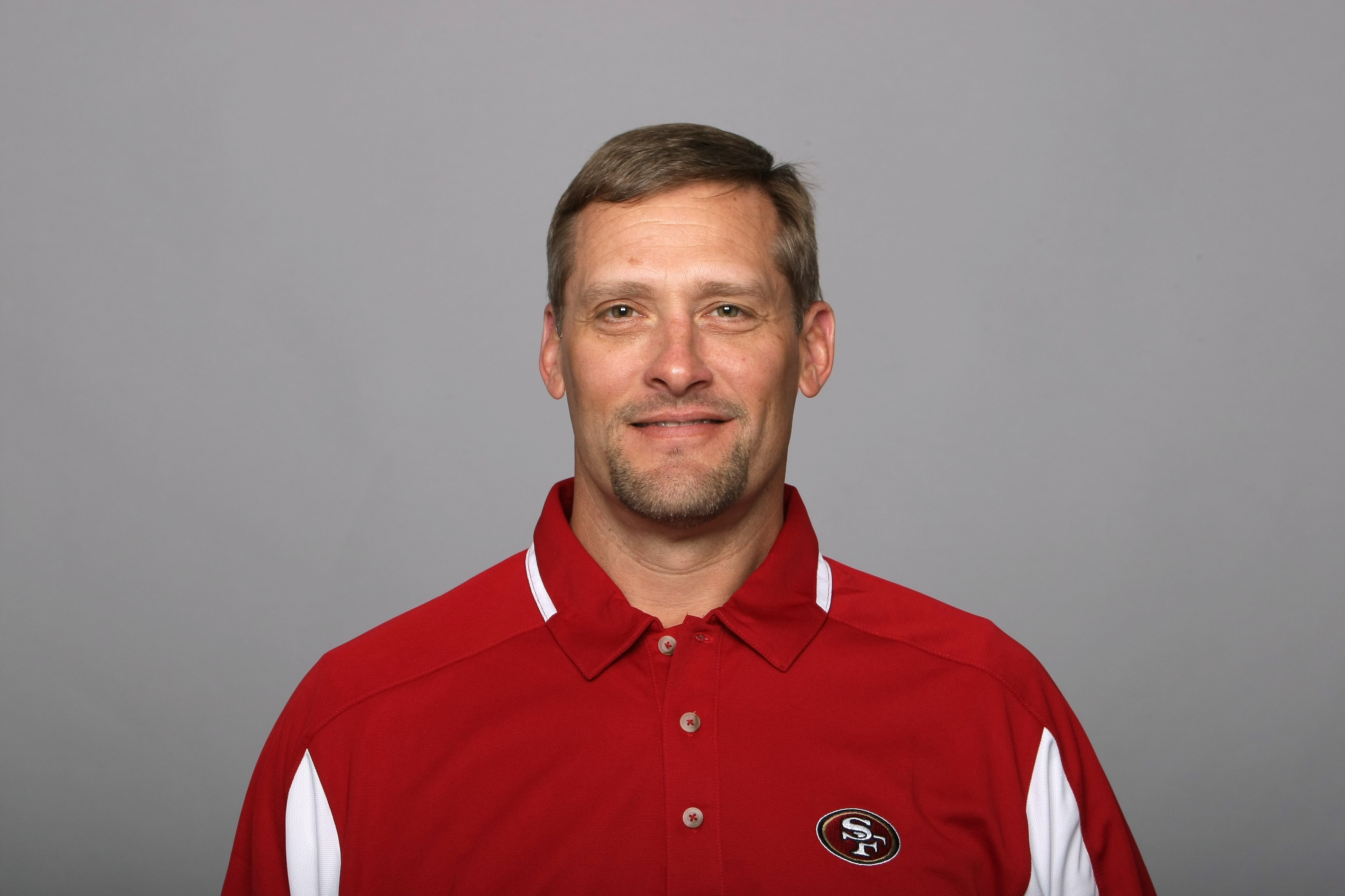 SAN FRANCISCO - 2009:  Tom Rathman of the San Francisco 49ers poses for his 2009 NFL headshot at photo day in San Francisco, California.  (Photo by NFL Photos)