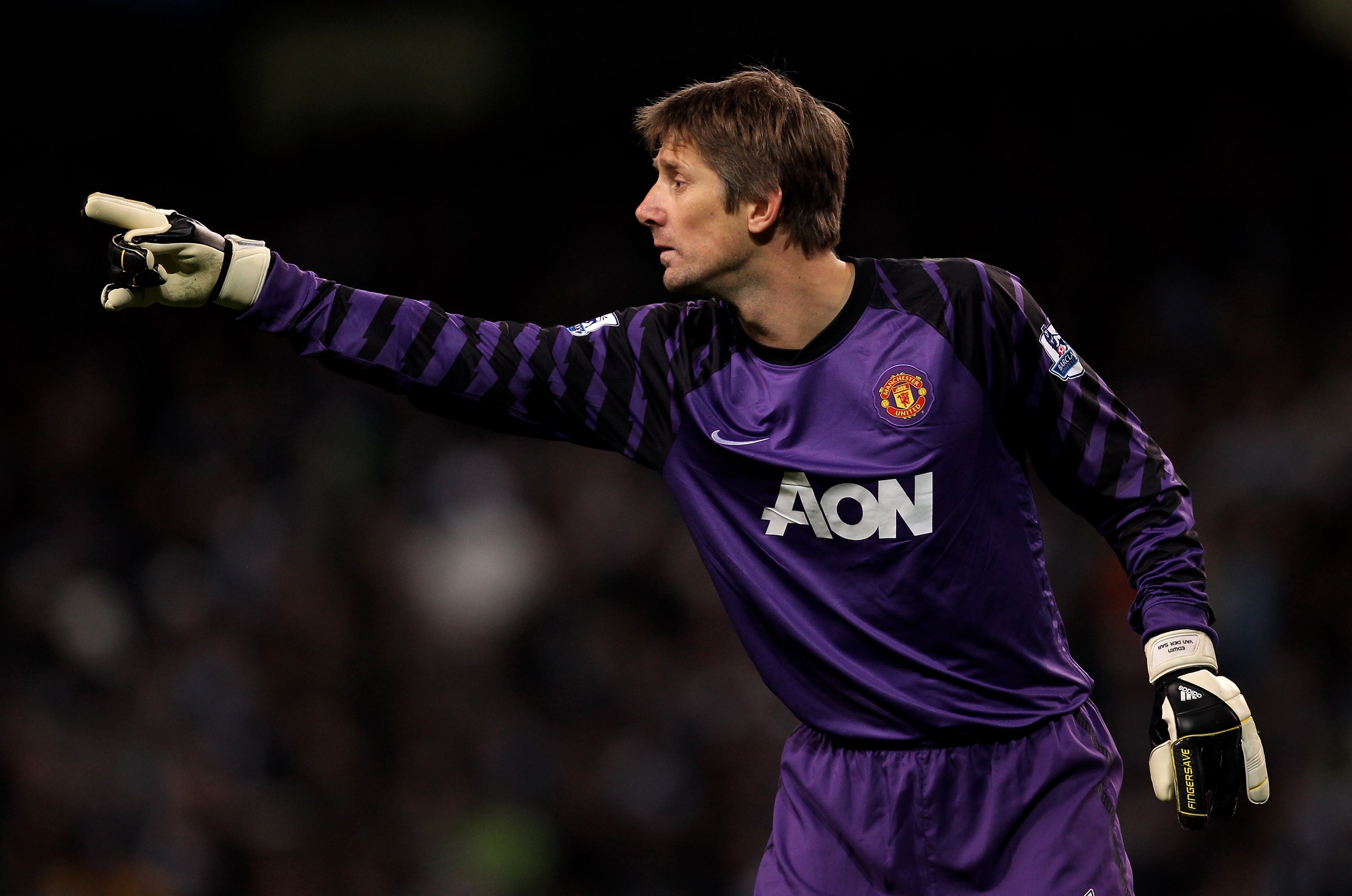MANCHESTER, ENGLAND - NOVEMBER 10:  Edwin van der Sar of Manchester United gestures during the Barclays Premier League match between Manchester City and Manchester United at the City of Manchester Stadium on November 10, 2010 in Manchester, England.  (Pho