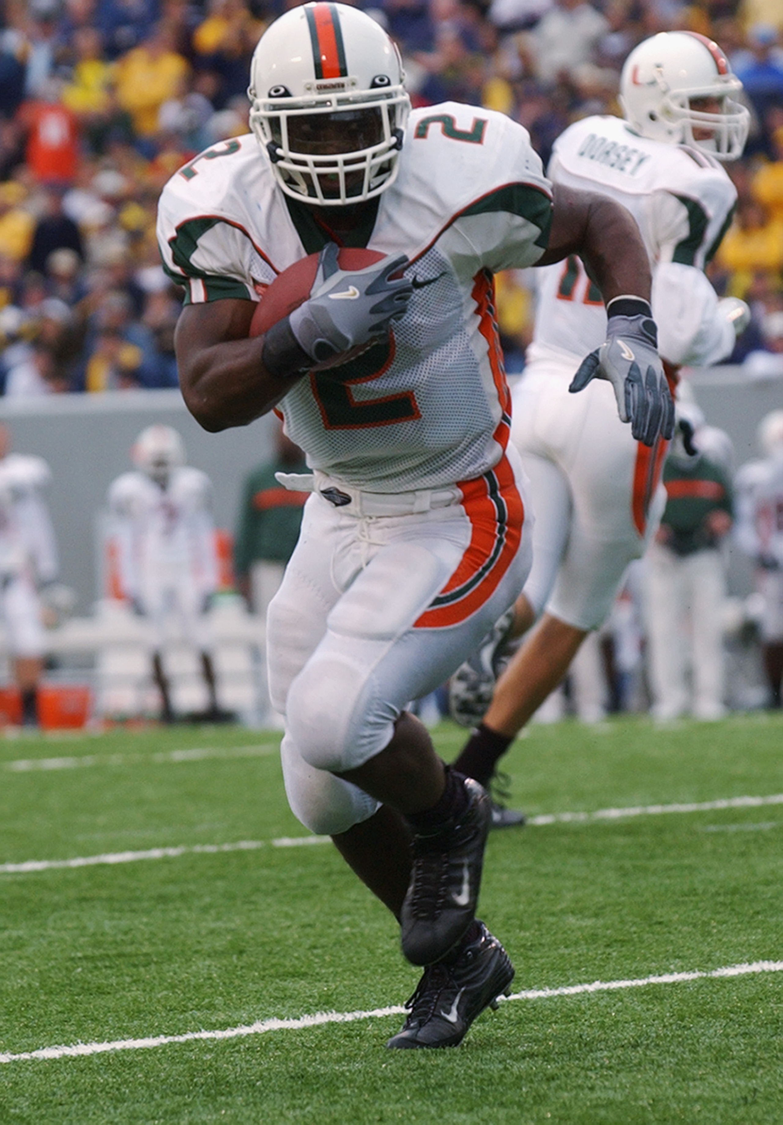 MORGANTOWN, WV - OCTOBER 26:  Running back Willis McGahee #2 of the University of Miami Hurricanes runs the ball against the West Virginia University Mountaineers during a Big East game on October 26, 2002 at Mountaineer Field in Morgantown, West Virginia