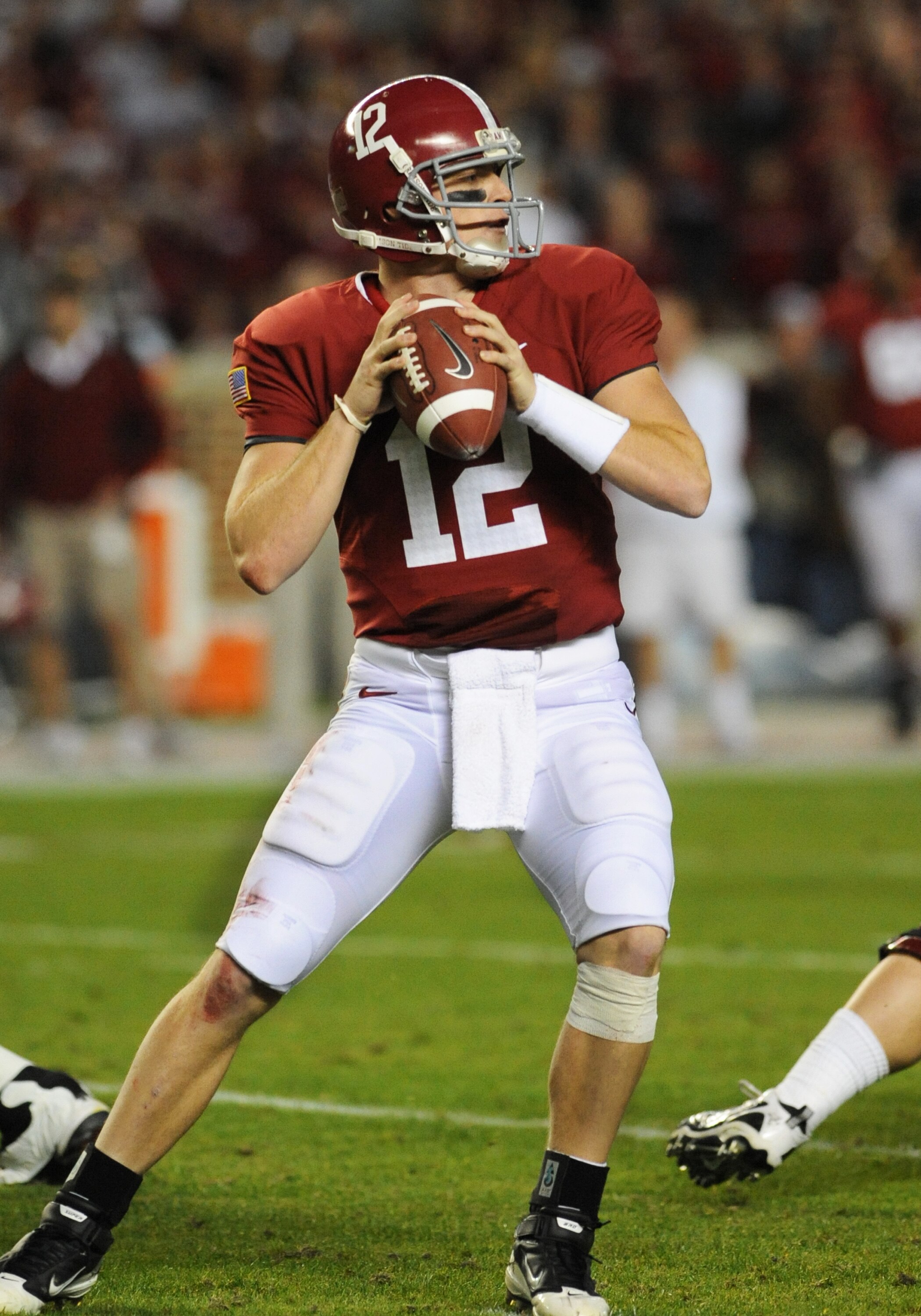 TUSCALOOSA, AL - NOVEMBER 13: Quarterback Greg McElroy #12 of the Alabama Crimson Tide sets to pass against the Mississippi State Bulldogs November 13, 2010 at Bryant-Denny Stadium in Tuscaloosa, Alabama.  (Photo by Al Messerschmidt/Getty Images)