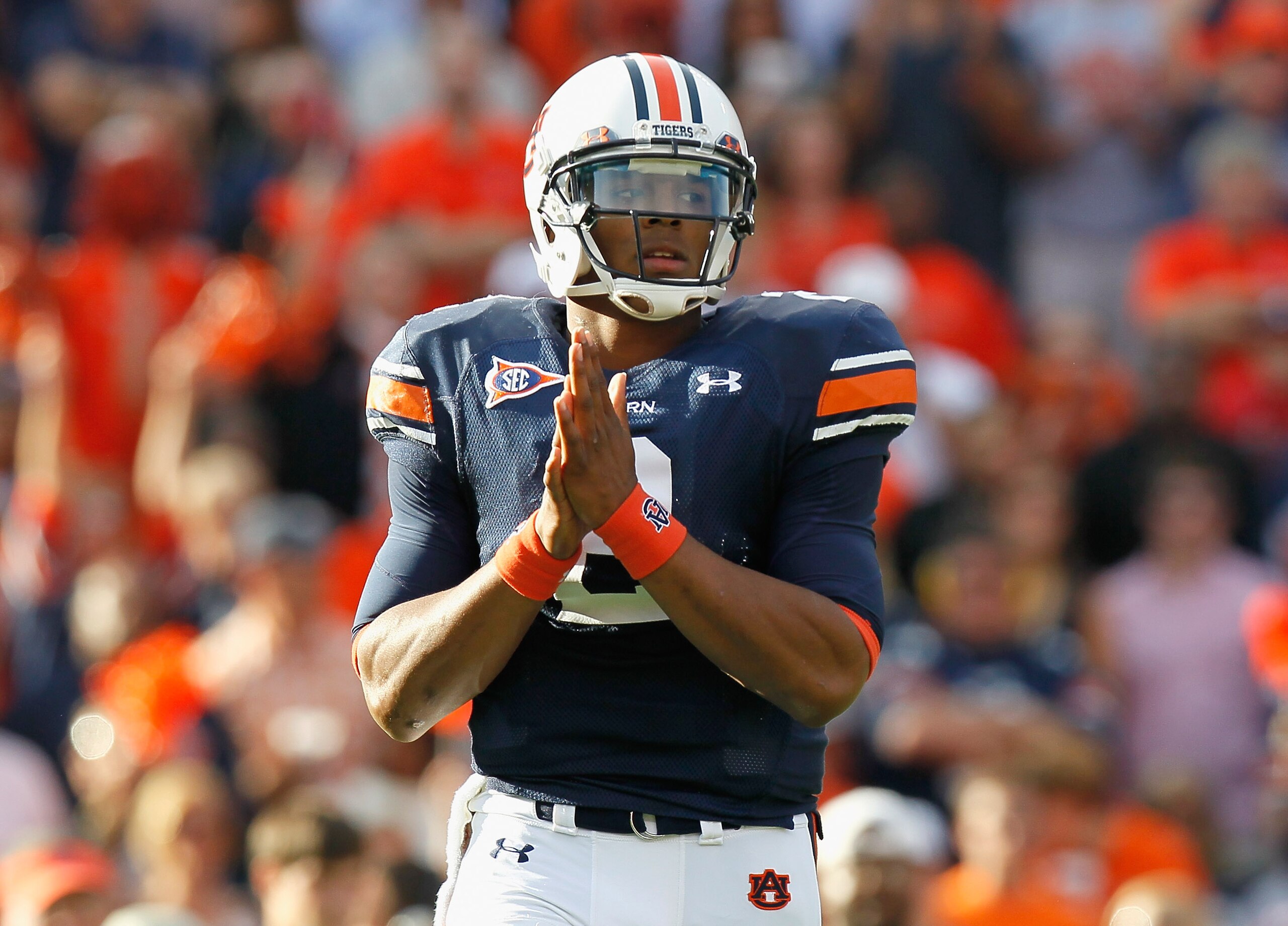 AUBURN, AL - NOVEMBER 13:  Quarterback Cameron Newton #2 of the Auburn Tigers walks onto the field for the first offensive series against the Georgia Bulldogs at Jordan-Hare Stadium on November 13, 2010 in Auburn, Alabama.  (Photo by Kevin C. Cox/Getty Im