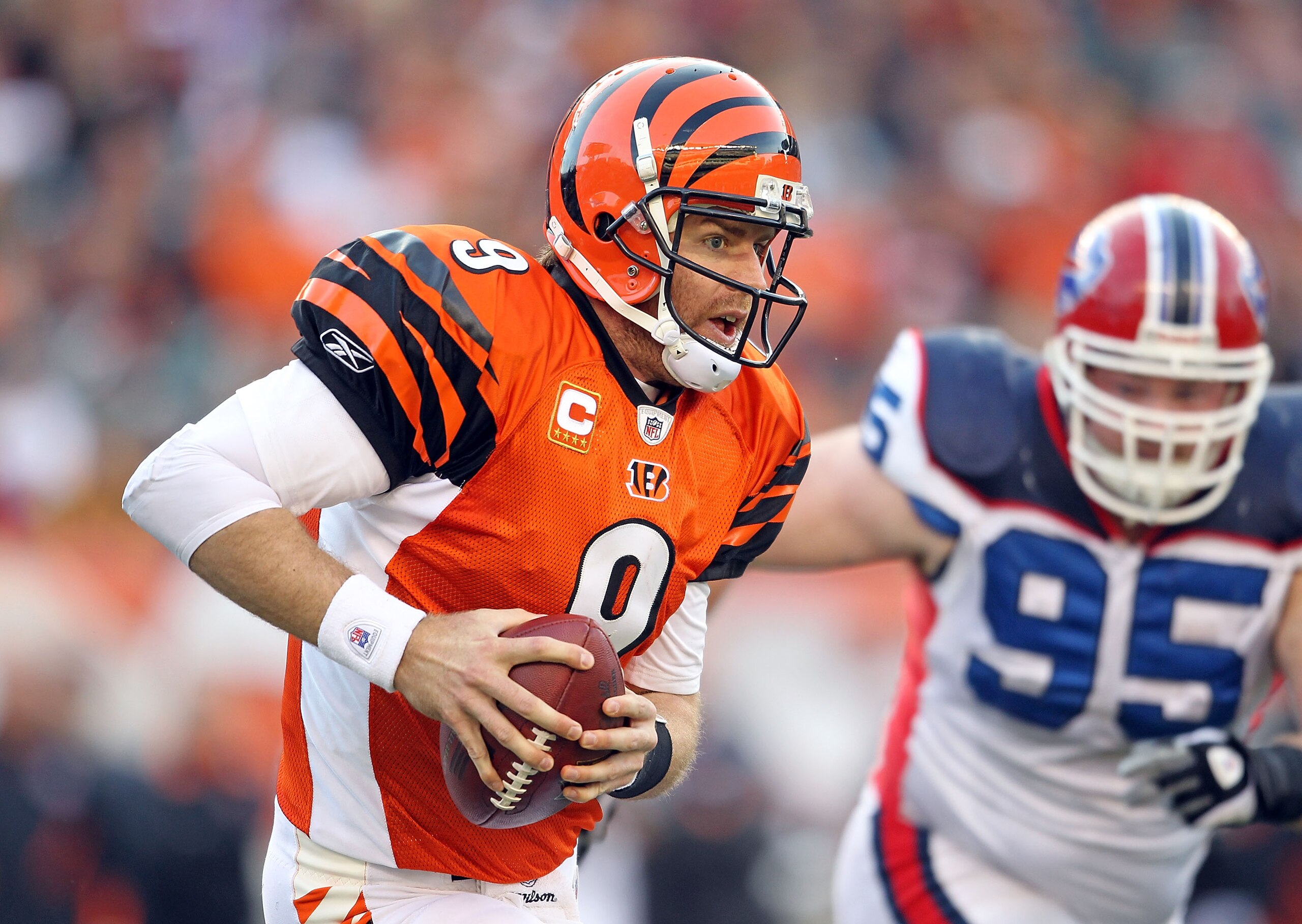 CINCINNATI - NOVEMBER 21: Carson Palmer #9 of the Cincinnati Bengals runs with the ball during the Bengals 49-31 loss to the Buffalo Bills at Paul Brown Stadium on November 21, 2010 in Cincinnati, Ohio. (Photo by Andy Lyons/Getty Images) CINCINNATI - NOVEMBER 21: Carson Palmer #9 of the Cincinnati Bengals runs with the ball during the Bengals 49-31 loss to the Buffalo Bills at Paul Brown Stadium on November 21, 2010 in Cincinnati, Ohio. (Photo by Andy Lyons/Getty Images)