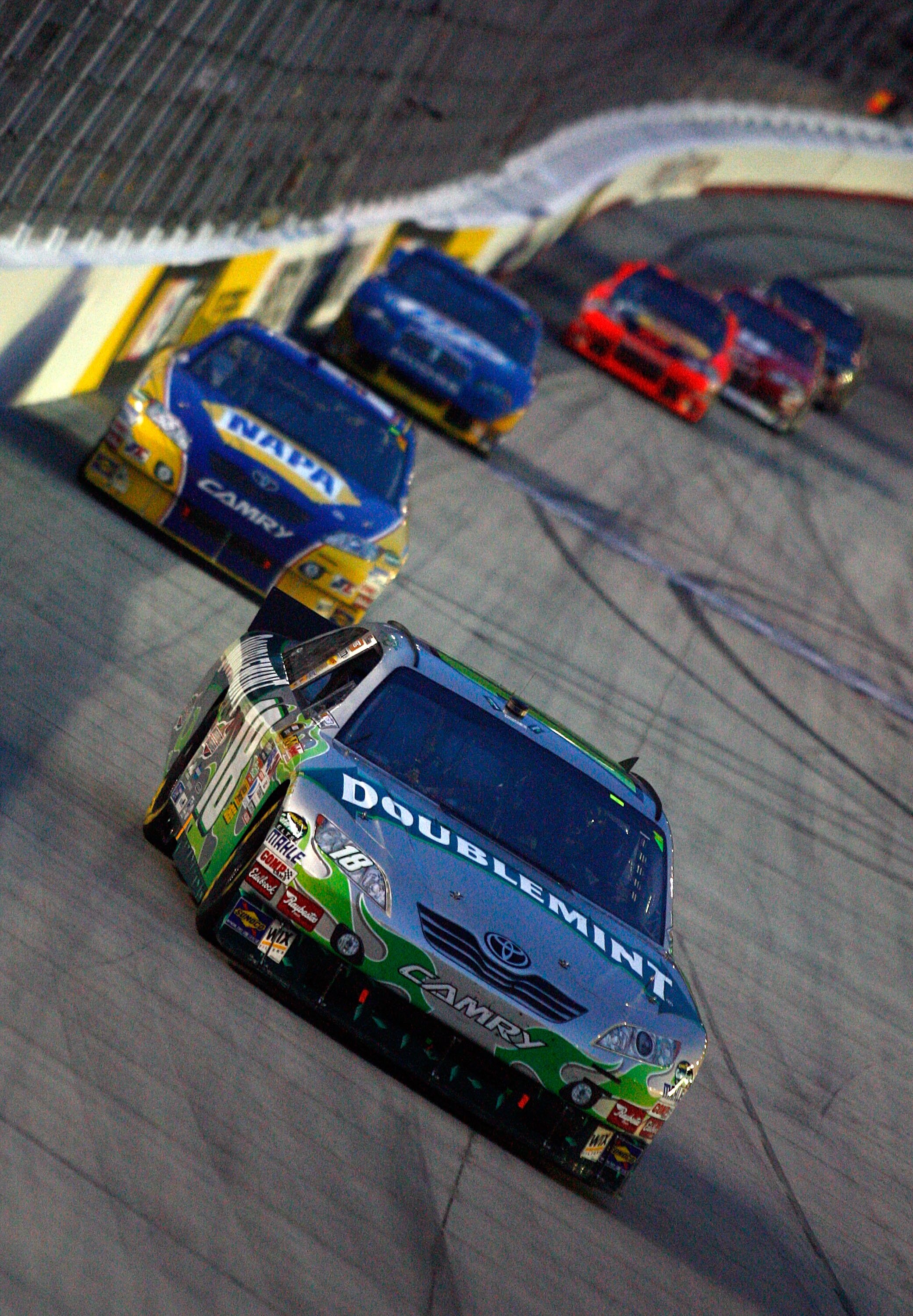 BRISTOL, TN - AUGUST 21:  Kyle Busch, driver of the #18 Doublemint Toyota, leads the field during the NASCAR Sprint Cup Series IRWIN Tools Night Race at Bristol Motor Speedway on August 21, 2010 in Bristol, Tennessee.  (Photo by Jason Smith/Getty Images)