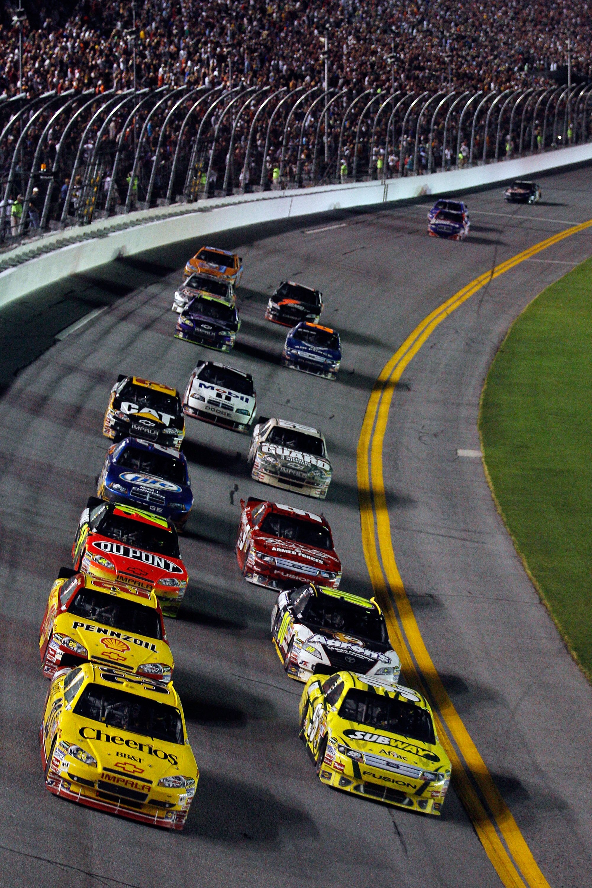 DAYTONA BEACH, FL - JULY 03:  Clint Bowyer, driver of the #33 Cheerios/Hamburger Helper Chevrolet, leads the field during the NASCAR Sprint Cup Series Coke Zero 400 at Daytona International Speedway on July 3, 2010 in Daytona Beach, Florida.  (Photo by Ch