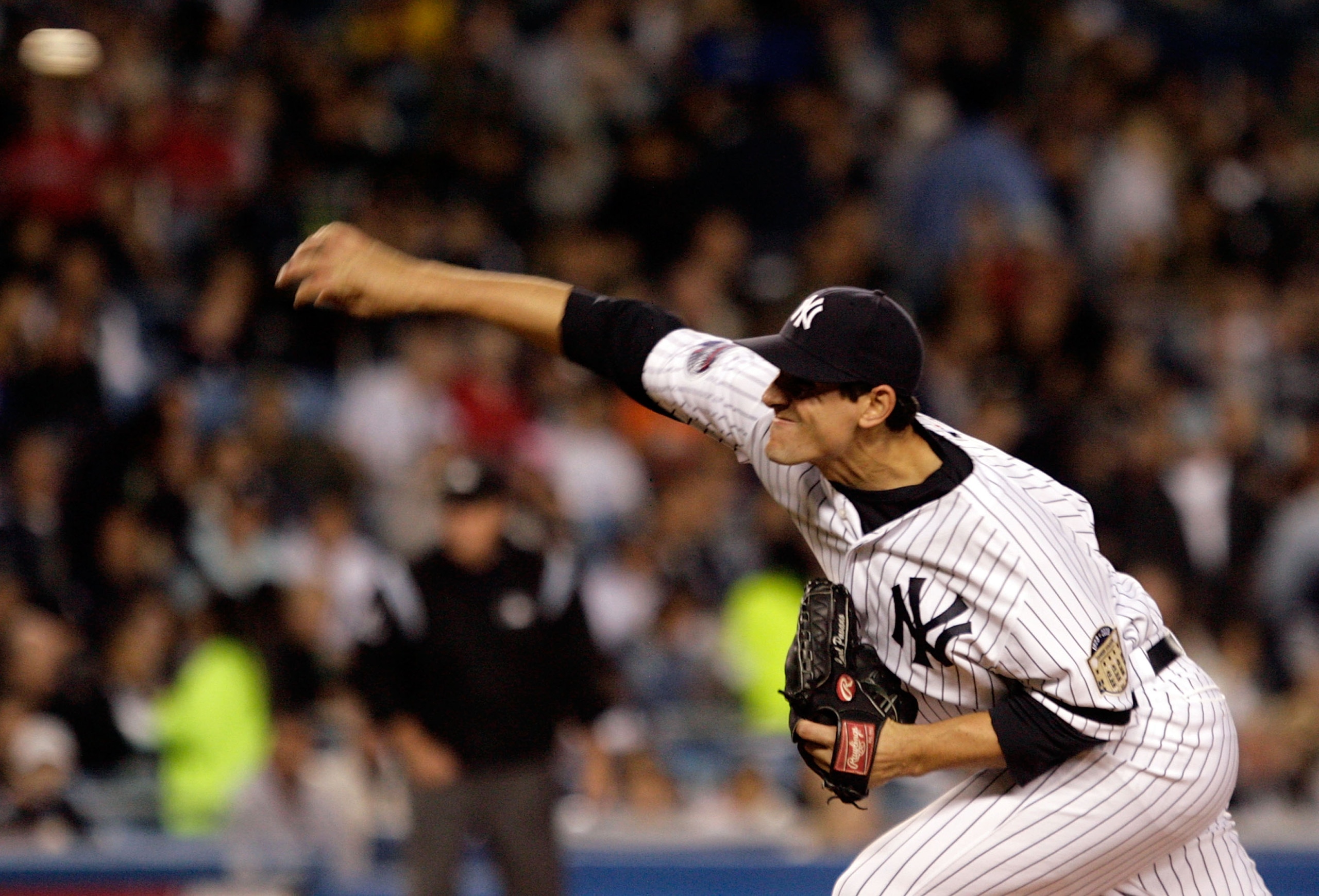 NEW YORK - SEPTEMBER 19:  Carl Pavano #45 of the New York Yankees pitches against the Baltimore Orioles on September 19, 2008 at Yankee Stadium in the Bronx borough of New York City.  (Photo by Jim McIsaac/Getty Images)