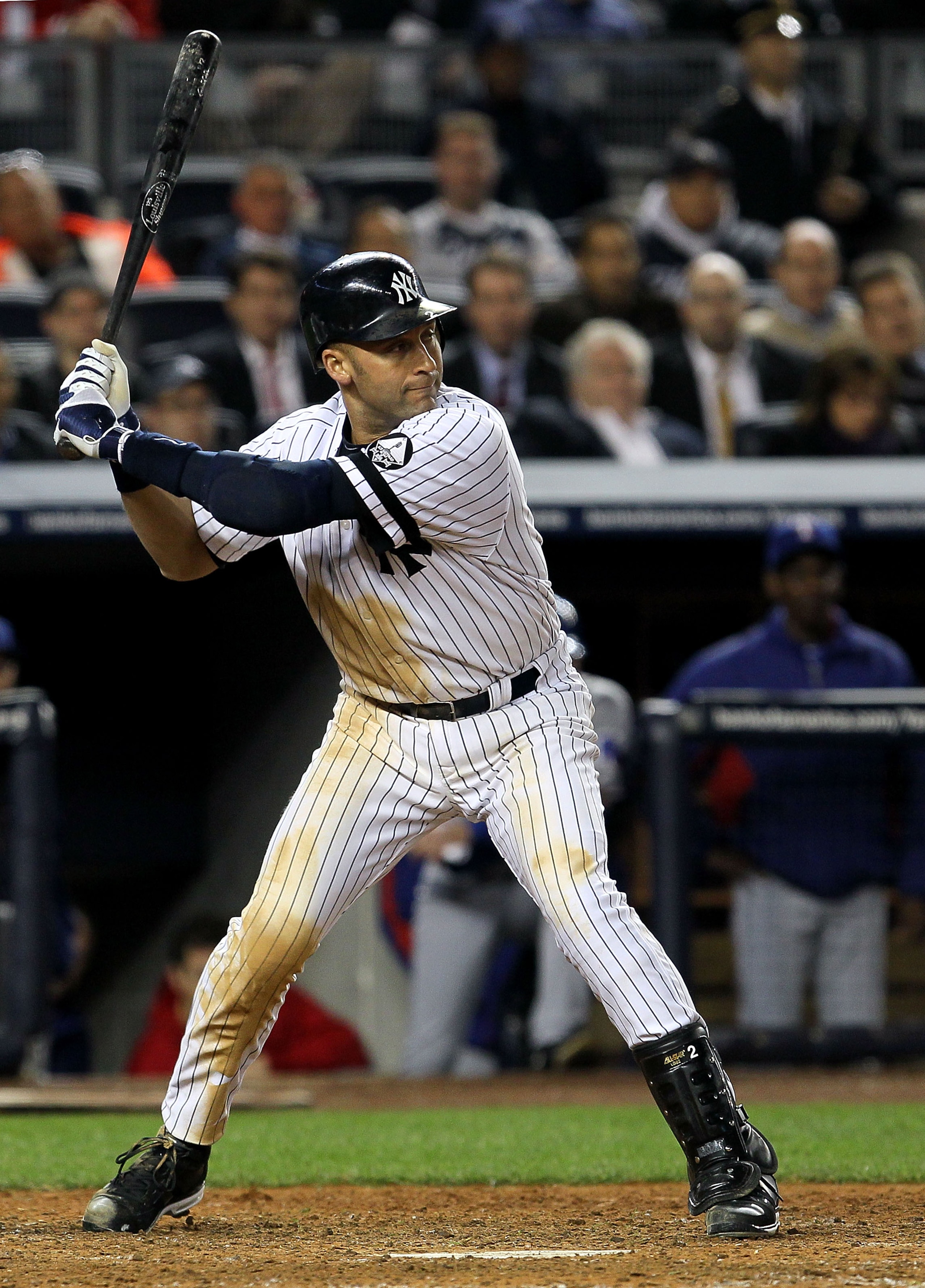NEW YORK - OCTOBER 19: Derek Jeter #2 of the New York Yankees bats against the Texas Rangers in Game Four of the ALCS during the 2010 MLB Playoffs at Yankee Stadium on October 19, 2010 in the Bronx borough of New York City. The Rangers won 10-3. (Photo b NEW YORK - OCTOBER 19: Derek Jeter #2 of the New York Yankees bats against the Texas Rangers in Game Four of the ALCS during the 2010 MLB Playoffs at Yankee Stadium on October 19, 2010 in the Bronx borough of New York City. The Rangers won 10-3. (Photo b