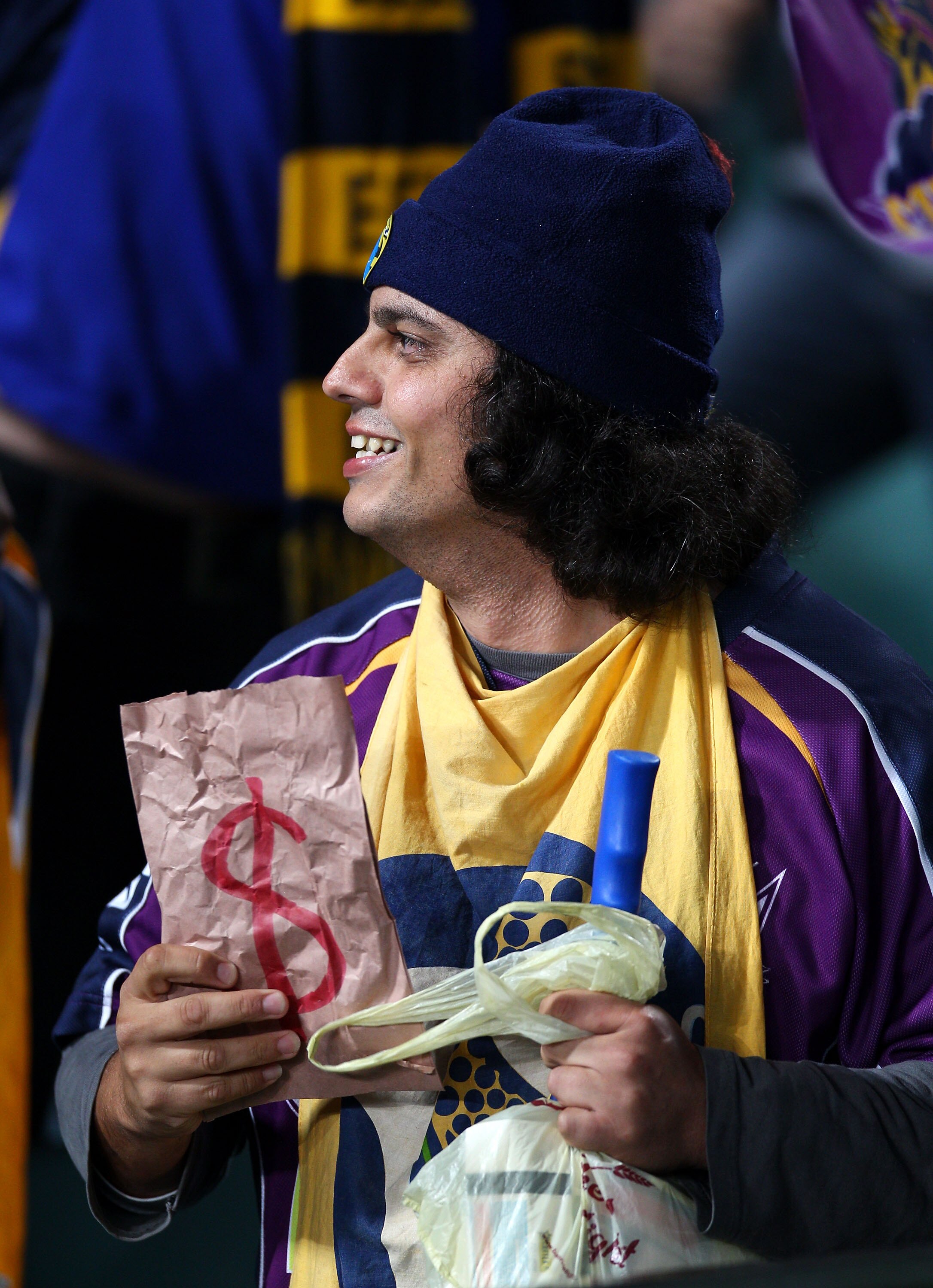 SYDNEY, AUSTRALIA - JUNE 04:  A Eels fan with a brown paper bag with a dollar sign is seen before the round 13 NRL match between the Parramatta Eels and the Melbourne Storm at Parramatta Stadium on June 4, 2010 in Sydney, Australia.  (Photo by Matt Blyth/