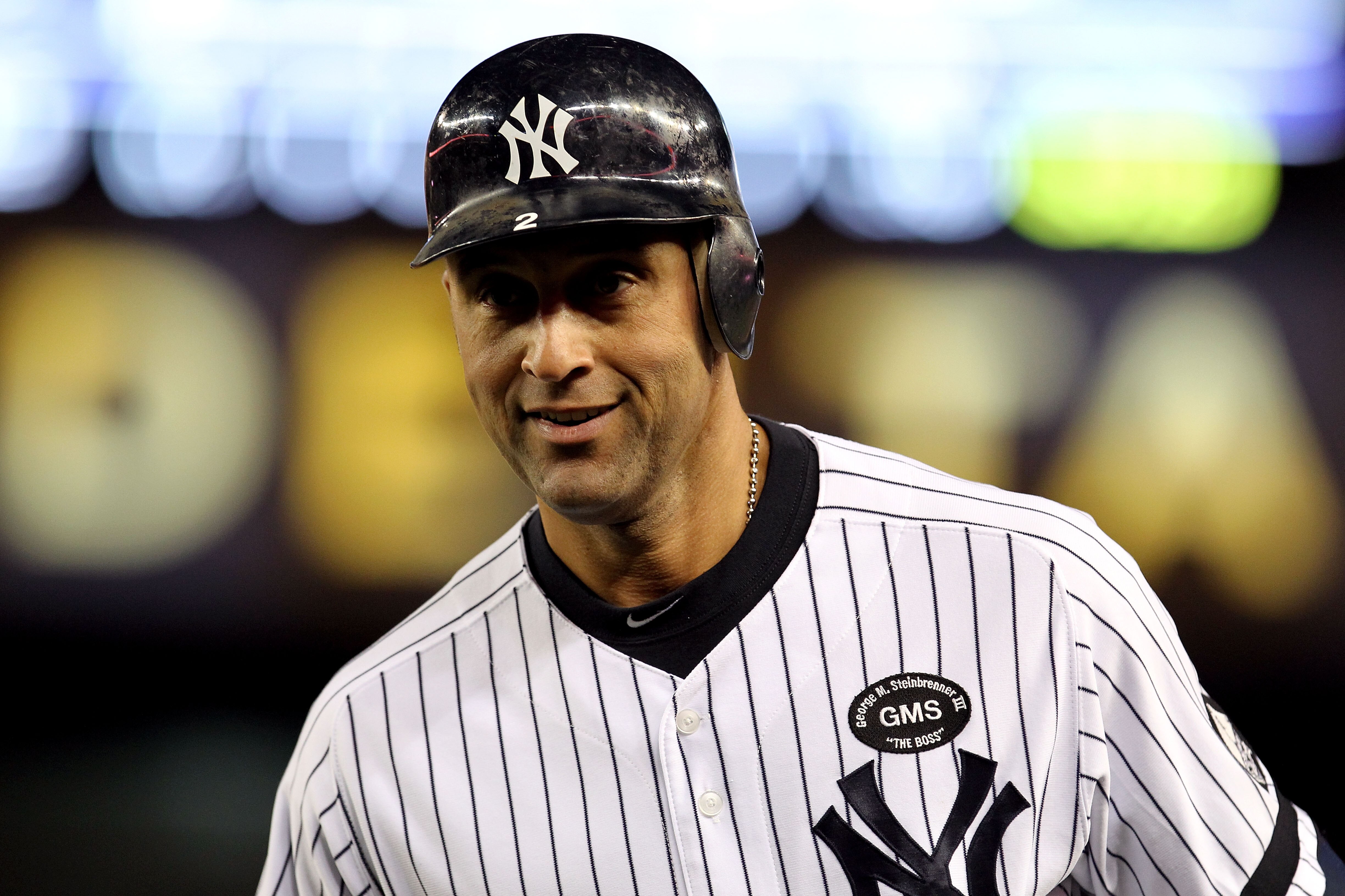 NEW YORK - OCTOBER 18:  Derek Jeter #2 of the New York Yankees looks on against the Texas Rangers in Game Three of the ALCS during the 2010 MLB Playoffs at Yankee Stadium on October 18, 2010 in New York, New York. The Rangers won 8-0.  (Photo by Al Bello/
