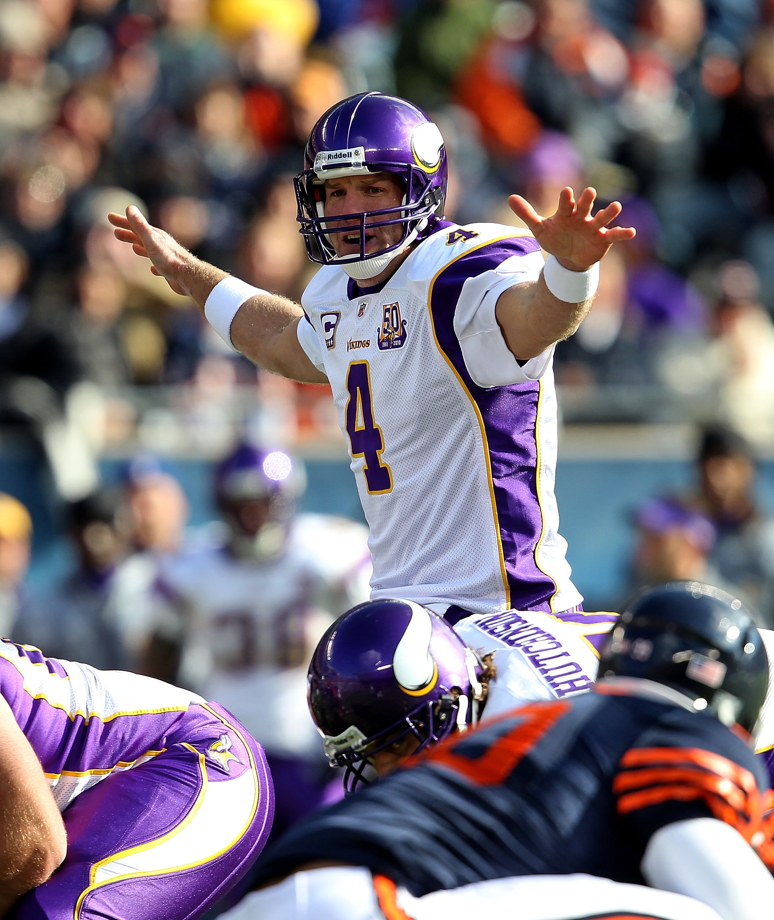 CHICAGO - NOVEMBER 14: Brett Favre #4 of the Minnesota Vikings looks over the Chicago Bear defense before taking the snap at Soldier Field on November 14, 2010 in Chicago, Illinois. The Bears defeated the Vikings 27-13. (Photo by Jonathan Daniel/Getty Ima