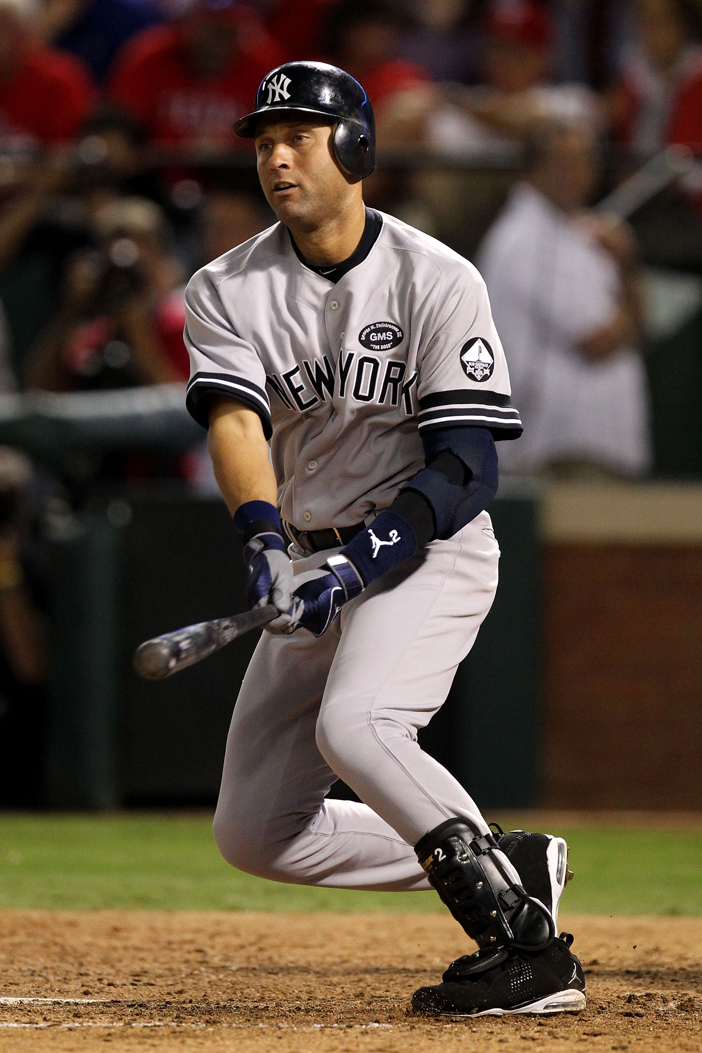 ARLINGTON, TX - OCTOBER 15:  Derek Jeter #2 of the New York Yankees hits a RBI double in the top of the eighth inning against the Texas Rangers in Game One of the ALCS during the 2010 MLB Playoffs at Rangers Ballpark in Arlington on October 15, 2010 in Ar
