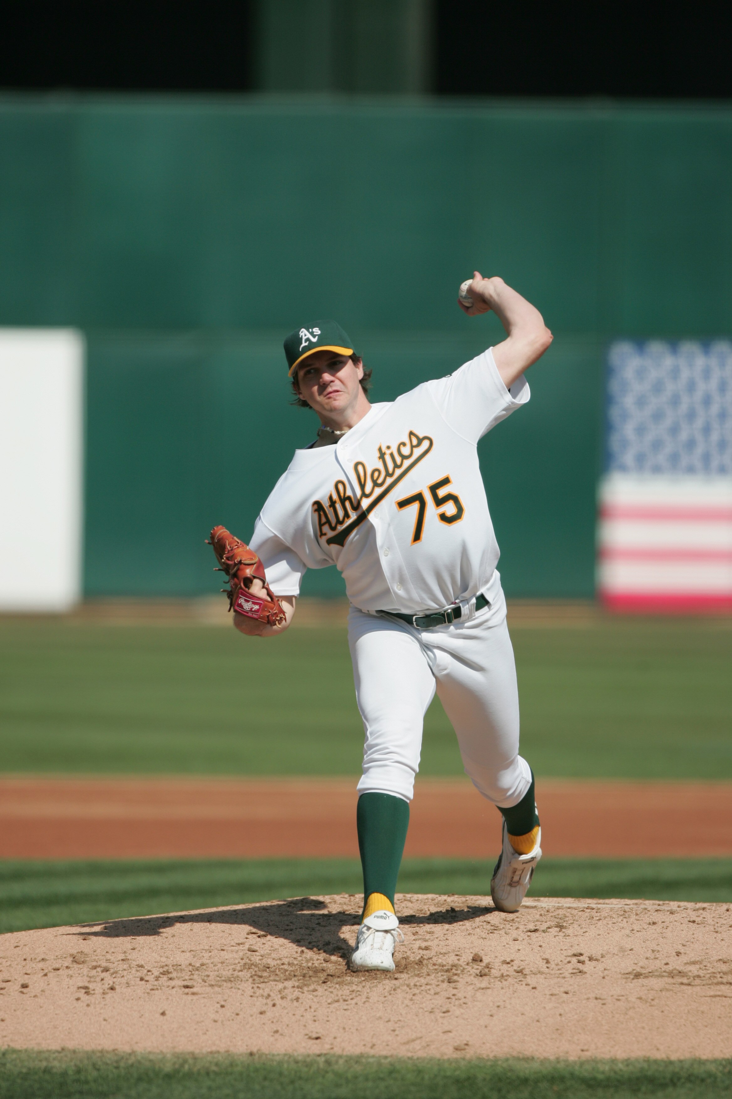 OAKLAND, CA - OCTOBER 2:  Pitcher Barry Zito #75 of the Oakland Athletics delivers a pitch against the Anaheim Angels during a MLB game at the Network Associates Coliseum on October 2, 2004 in Oakland, California. The Angeles won 5-4.  (Photo by Jed Jacob