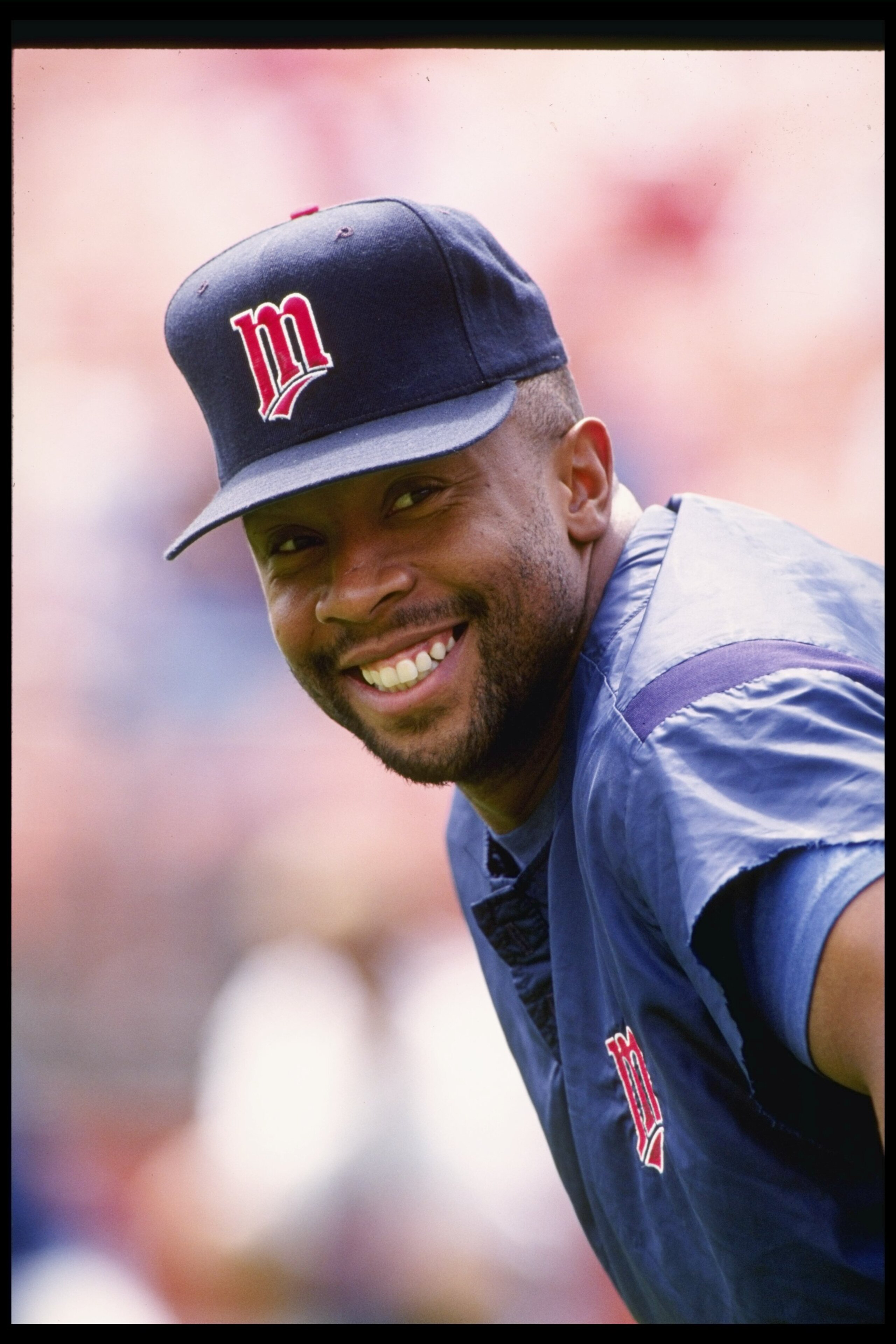 25 Jul 1992:  Outfielder Kirby Puckett of the Minnesota Twins smiles at the camera during a game against the Oakland Athletics at Oakland Alameda County Coliseum in Oakland, California.  Mandatory Credit: Otto Greule Jr.  /Allsport