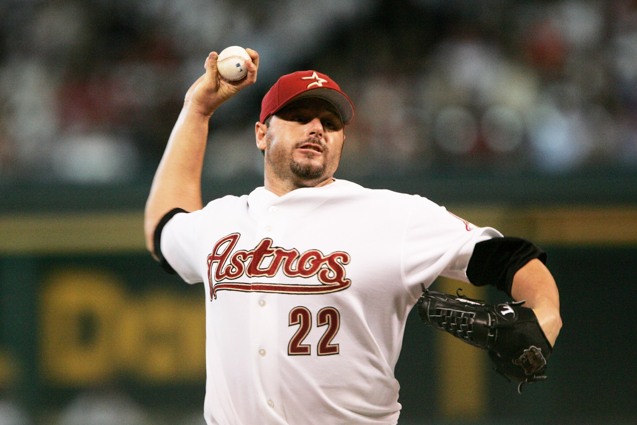 HOUSTON - OCTOBER 15:  Roger Clemens #22 of the Houston Astros delivers a pitch in Game three of National League Championship Series against the St. Louis Cardinals during the 2004 Major League Baseball Playoffs on October 16, 2004 at Minute Maid Park in