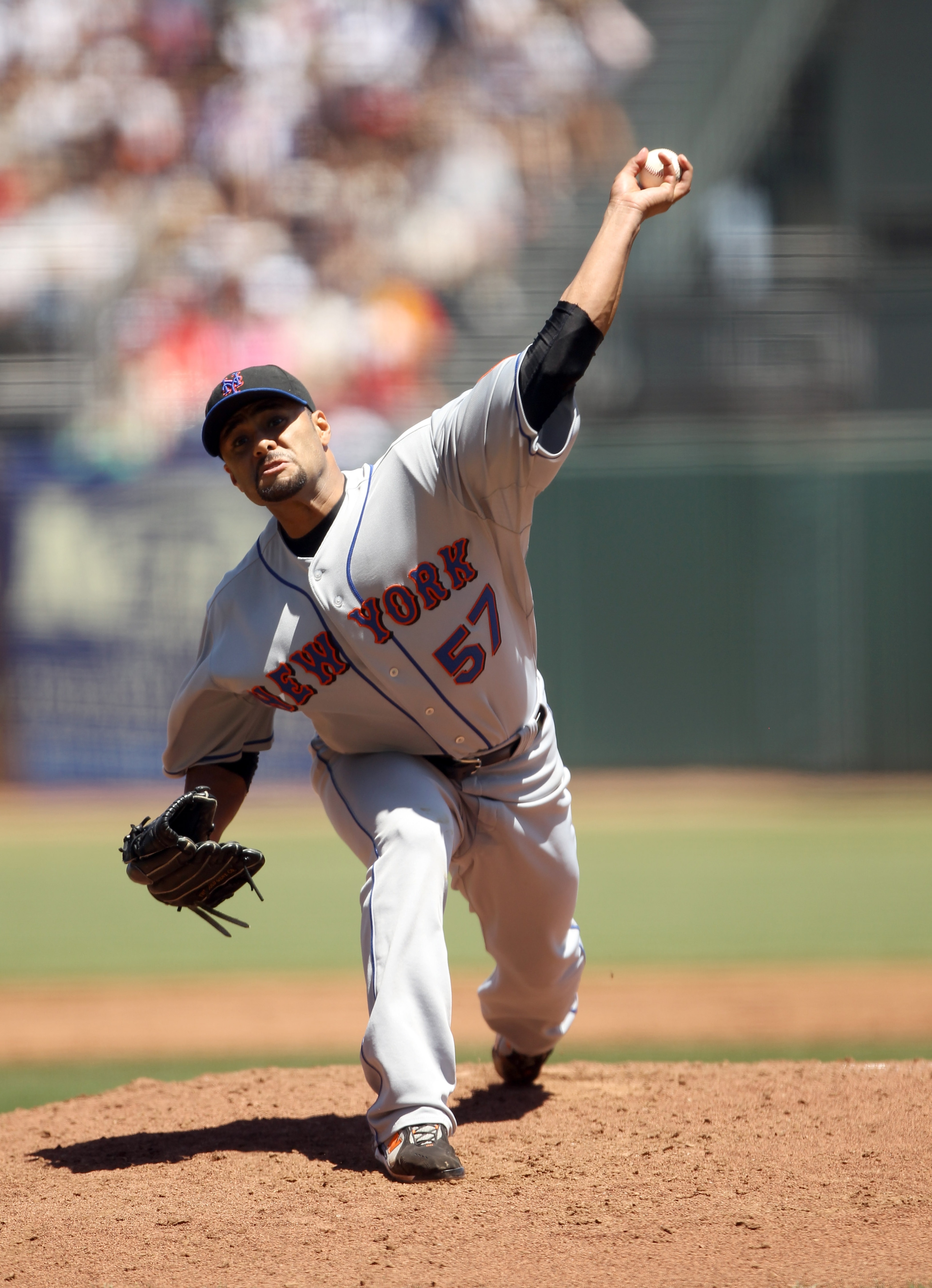 SAN FRANCISCO - JULY 18:  Johan Santana #57 of the New York Mets pitches against the San Francisco Giants at AT&T Park on July 18, 2010 in San Francisco, California.  (Photo by Ezra Shaw/Getty Images)