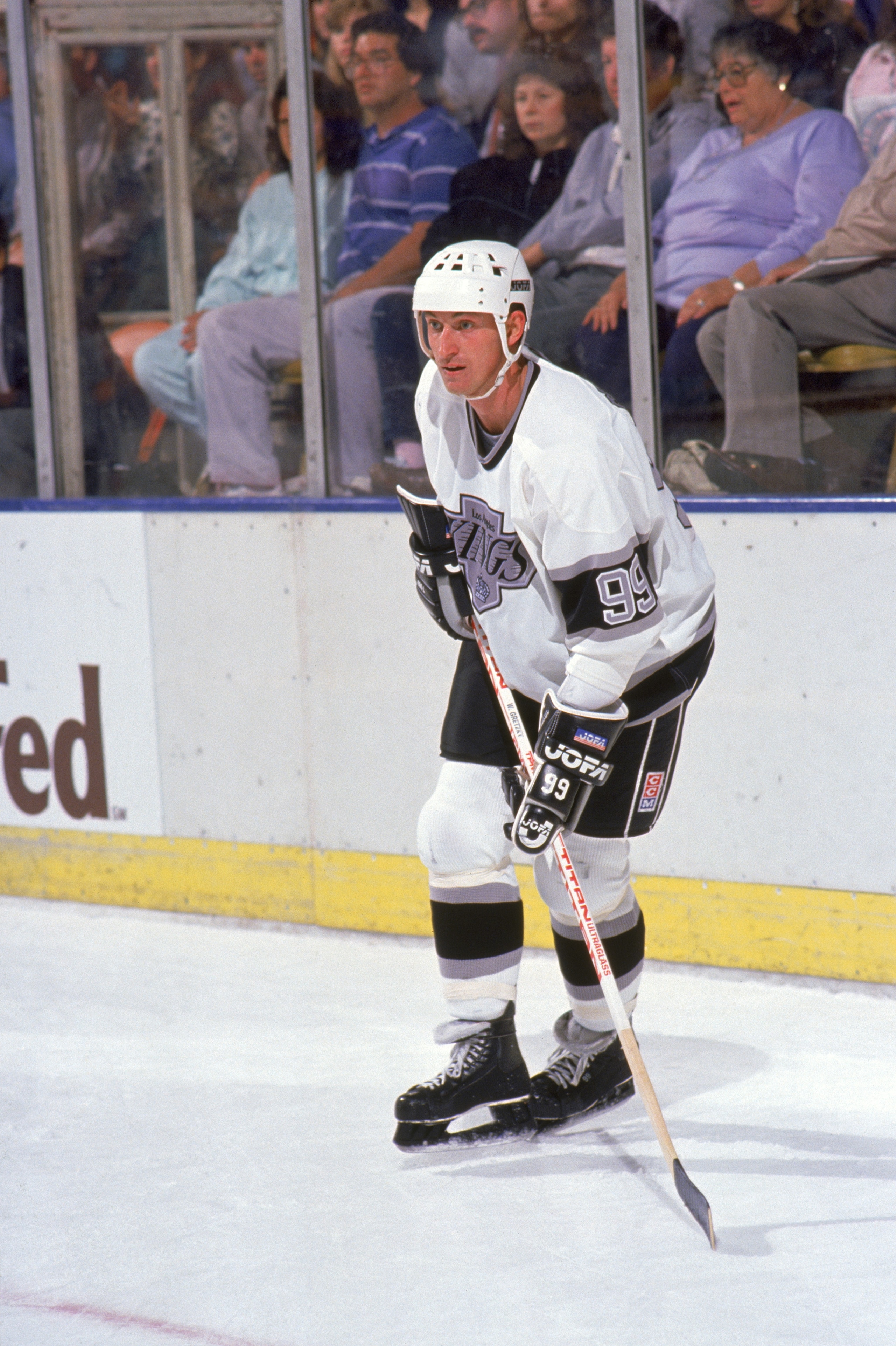 INGLEWOOD, CA - 1989:  Wayne Gretzky #99 of the Los Angeles Kings skates during a game in 1989 at the Great Western Forum in Inglewood, California.  Wayne Gretzky played for the Kings from 1988 - 1996.  (Photo by Mike Powell/Getty Images)