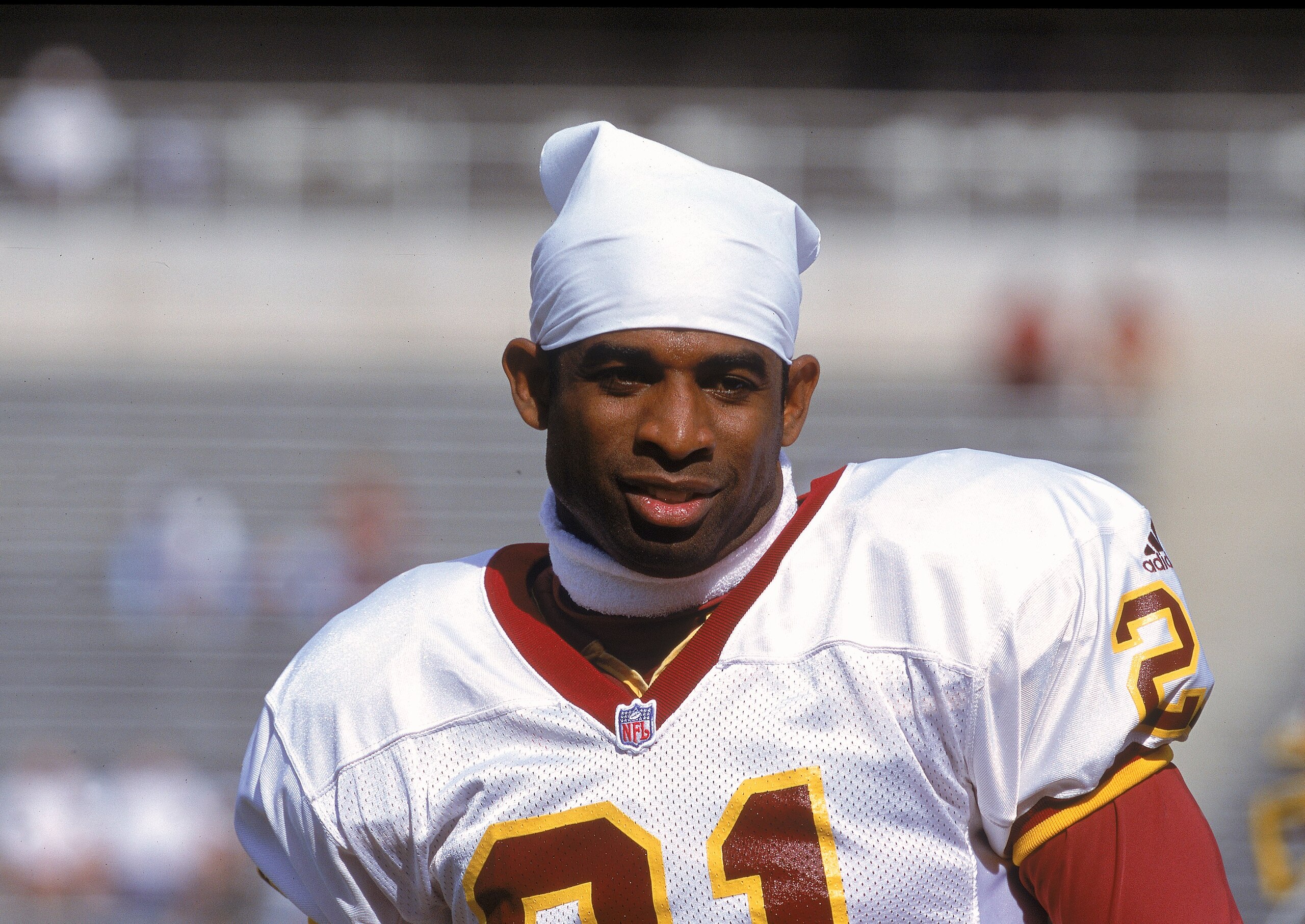 5 Nov 2000: Deion Sanders #21 of the Washington Redskins looks on the field during the game against the  Arizona Cardinals at the Sun Devil Stadium in Tempe, Arizona.  The Cardinals defeated the Redskins 16-15.Mandatory Credit: Jon Ferrey  /Allsport