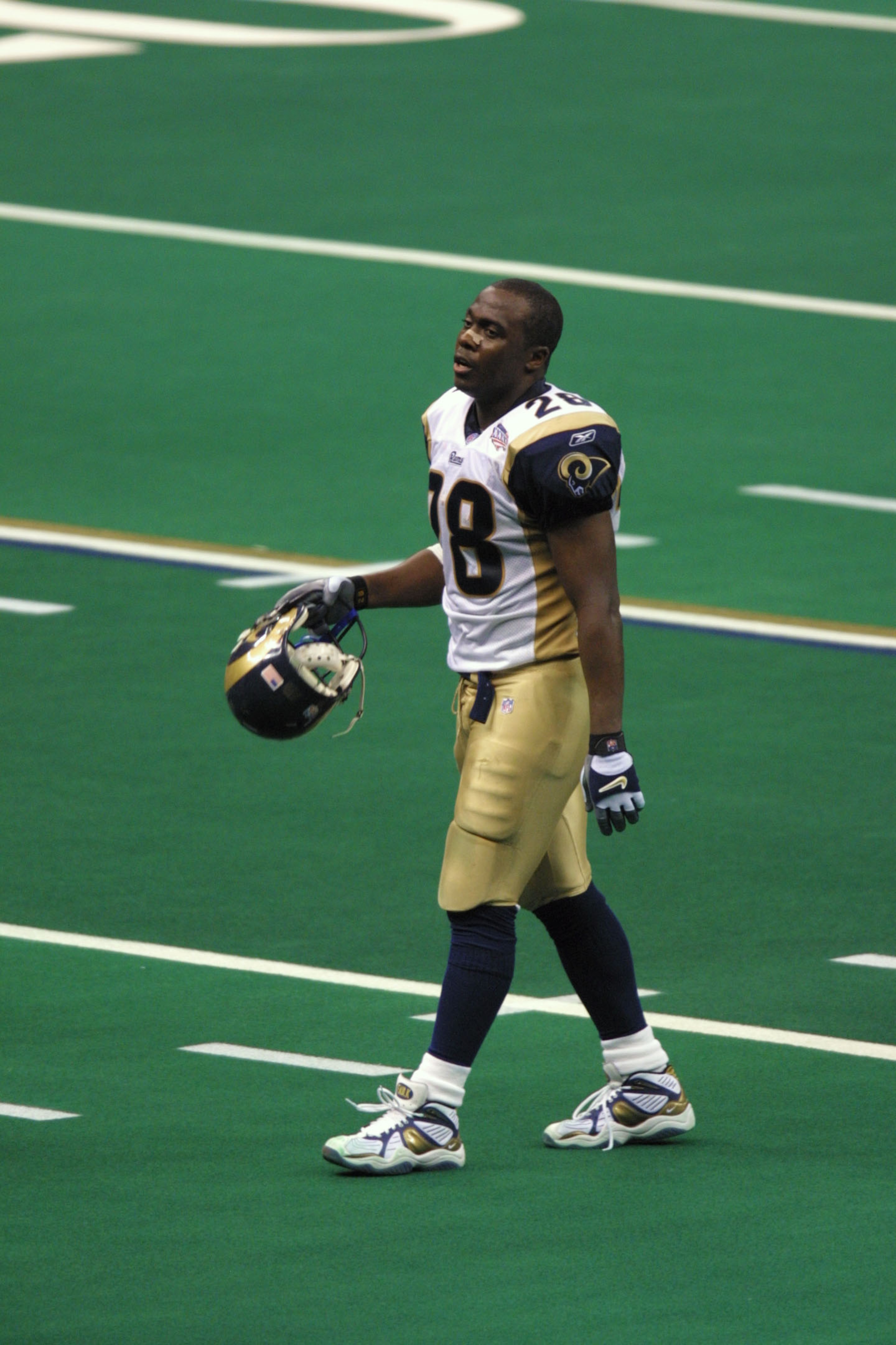 03 Feb 2002:   Marshall Faulk of the St.Louis Rams walks off the field during the game against the New England Patriots at Superbowl XXXVI at the Superdome in New Orleans, Louisiana.  The Patriots defeated the Rams 20-17. DIGITAL IMAGE. Mandatory Credit: