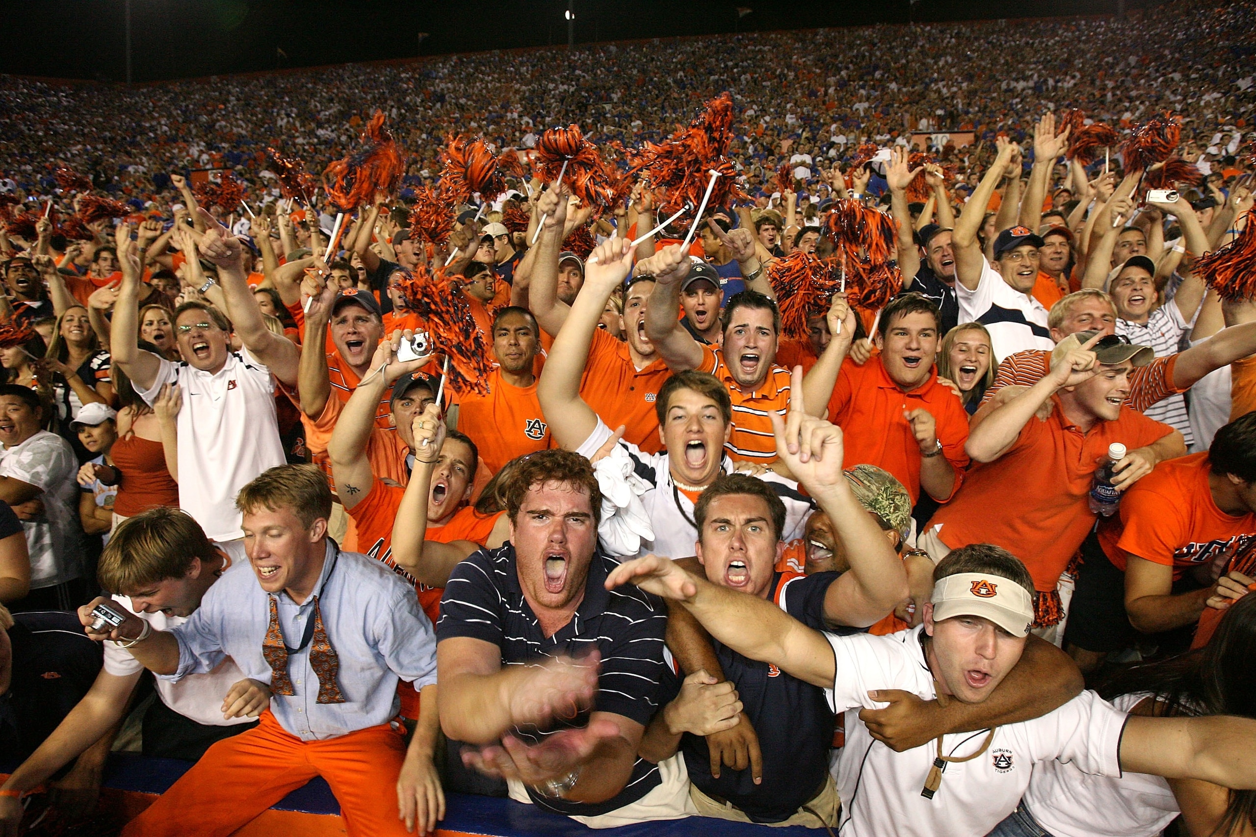 GAINESVILLE, FL - SEPTEMBER 29: Fans for the Auburn Tigers celebrate after defeating the Florida Gators at Ben Hill Griffin Stadium September 29, 2007 in Gainesville, Florida. (Photo by Doug Benc/Getty Images) GAINESVILLE, FL - SEPTEMBER 29: Fans for the Auburn Tigers celebrate after defeating the Florida Gators at Ben Hill Griffin Stadium September 29, 2007 in Gainesville, Florida. (Photo by Doug Benc/Getty Images)