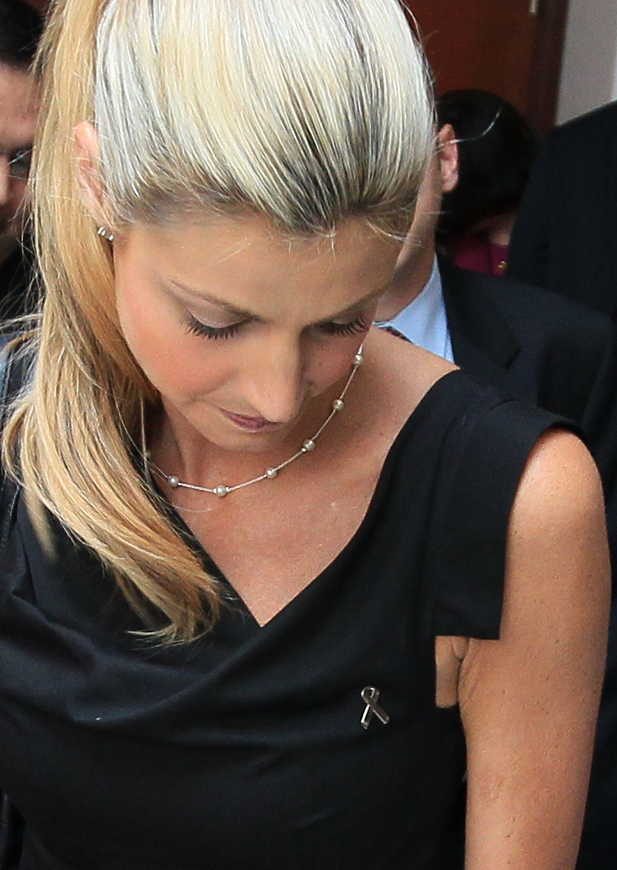 WASHINGTON - JULY 27:  ESPN reporter Erin Andrews looks down as she talks to members of the media after a news conference about proposing new legislation that would clarify federal stalking laws on Capitol Hill July 27, 2010 in Washington, DC. Andrews who