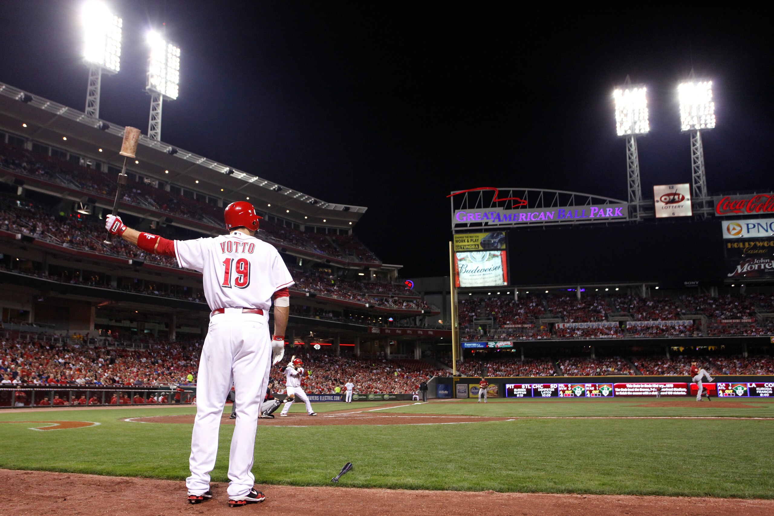 CINCINNATI, OH - SEPTEMBER 28: Joey Votto #19 of the Cincinnati Reds waits to bat against the Houston Astros at Great American Ball Park on September 28, 2010 in Cincinnati, Ohio. The Reds won 3-2 to clinch the NL Central Division title. (Photo by Joe Rob CINCINNATI, OH - SEPTEMBER 28: Joey Votto #19 of the Cincinnati Reds waits to bat against the Houston Astros at Great American Ball Park on September 28, 2010 in Cincinnati, Ohio. The Reds won 3-2 to clinch the NL Central Division title. (Photo by Joe Rob