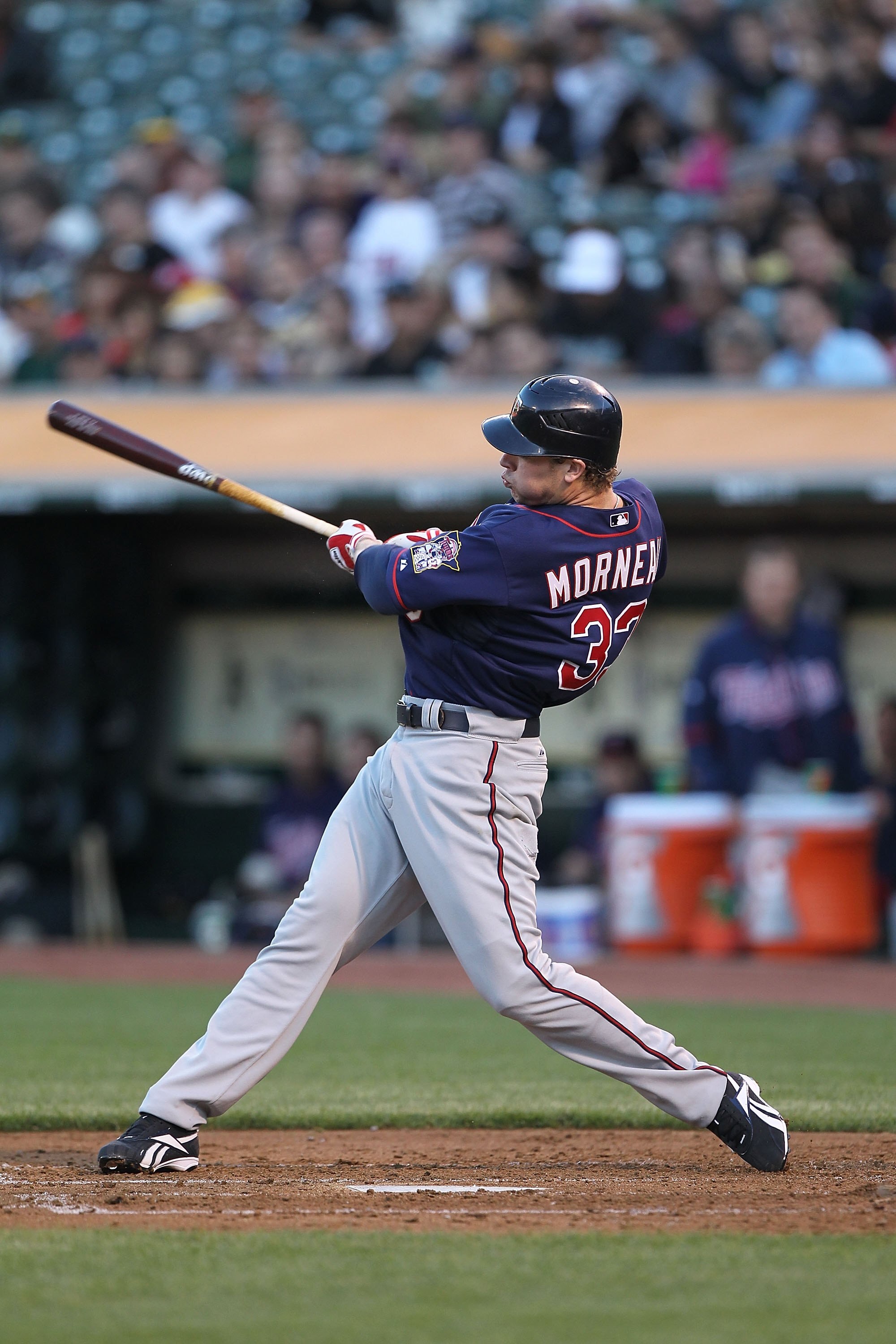 OAKLAND, CA - JUNE 04:  Justin Morneau #33 of the Minnesota Twins bats against the Oakland Athletics during an MLB game at the Oakland-Alameda County Coliseum on June 4, 2010 in Oakland, California.  (Photo by Jed Jacobsohn/Getty Images)
