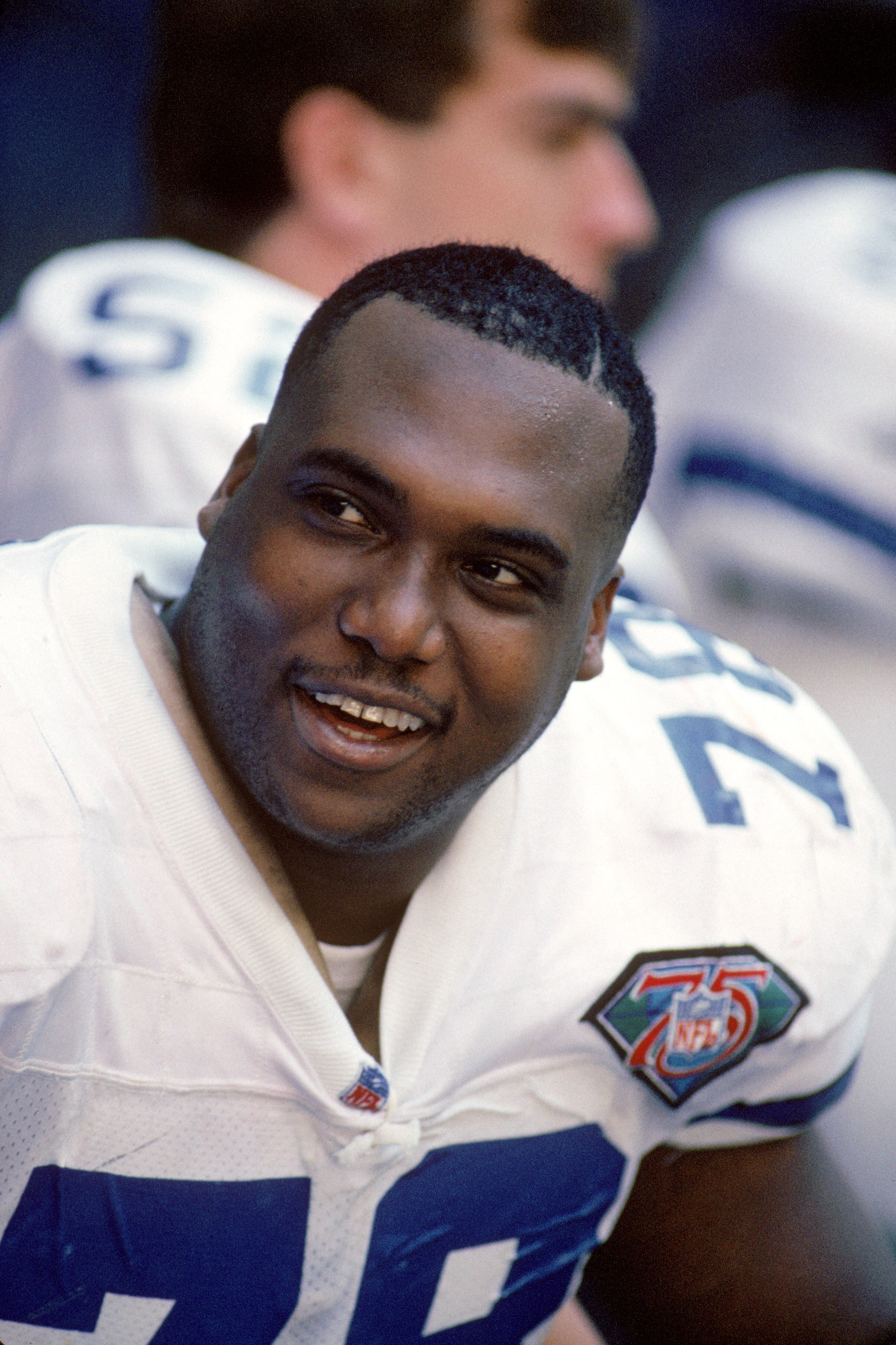 DALLAS - NOVEMBER 20:  Defensive end Leon Lett #78 of the Dallas Cowboys sits on the bench during a game against the Washington Redskins at Texas Stadium on November 20, 1994 in Dallas Texas.  The Cowboys won 31-7.  (Photo by George Rose/Getty Images)