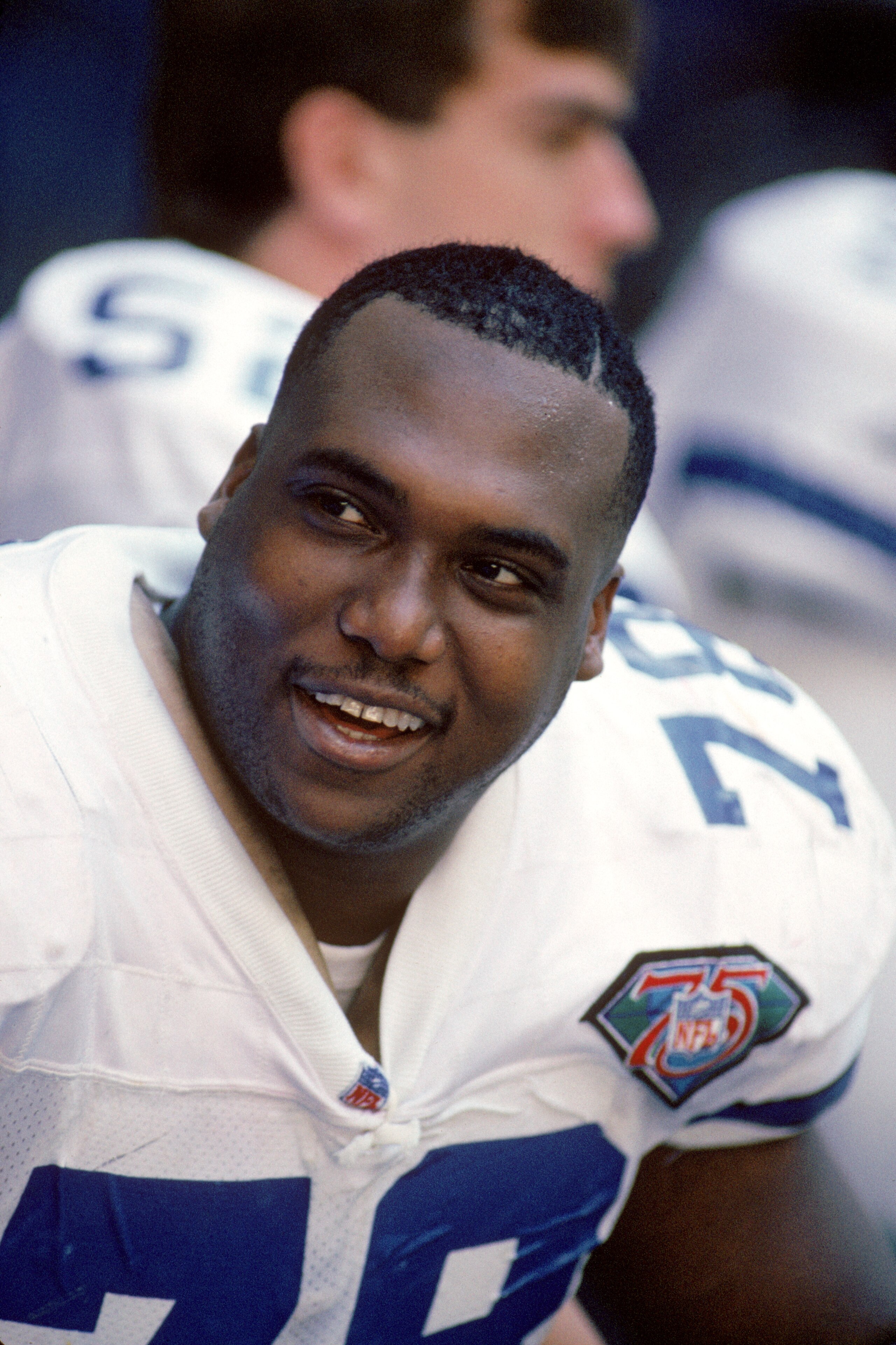 DALLAS - NOVEMBER 20:  Defensive end Leon Lett #78 of the Dallas Cowboys sits on the bench during a game against the Washington Redskins at Texas Stadium on November 20, 1994 in Dallas Texas.  The Cowboys won 31-7.  (Photo by George Rose/Getty Images)