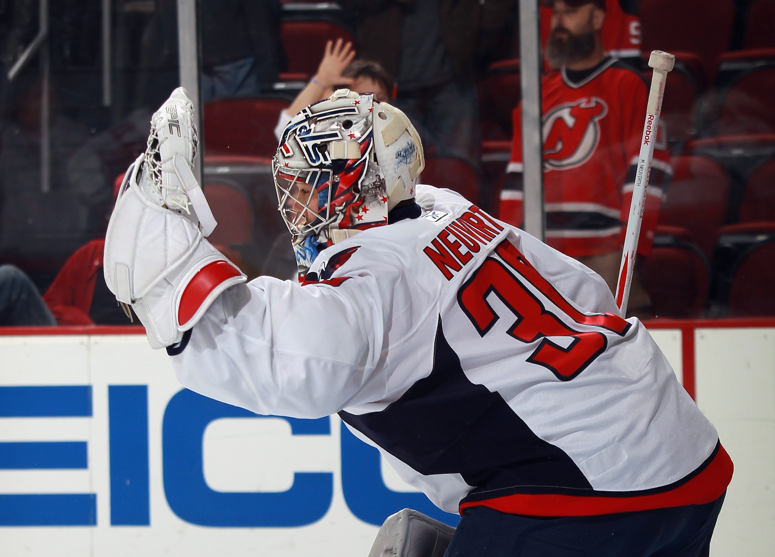 NEWARK, NJ - NOVEMBER 22:  Michal Neuvirth #30 of the Washington Capitals tends net in warmups prior to the game against the New Jersey Devils at the Prudential Center on November 22, 2010 in Newark, New Jersey. The Devils defeated the Capitals 5-0.  (Pho