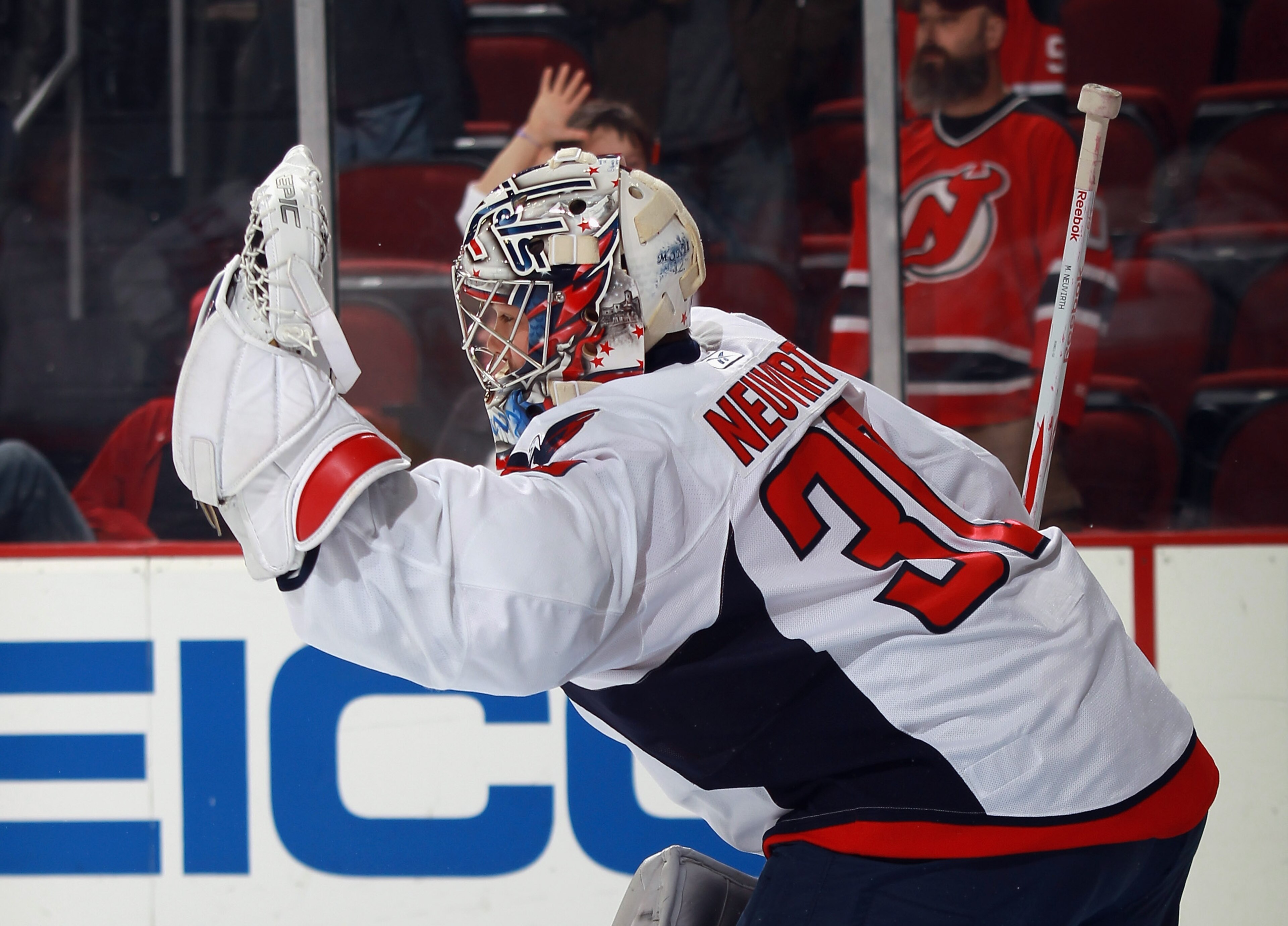 NEWARK, NJ - NOVEMBER 22:  Michal Neuvirth #30 of the Washington Capitals tends net in warmups prior to the game against the New Jersey Devils at the Prudential Center on November 22, 2010 in Newark, New Jersey. The Devils defeated the Capitals 5-0.  (Pho