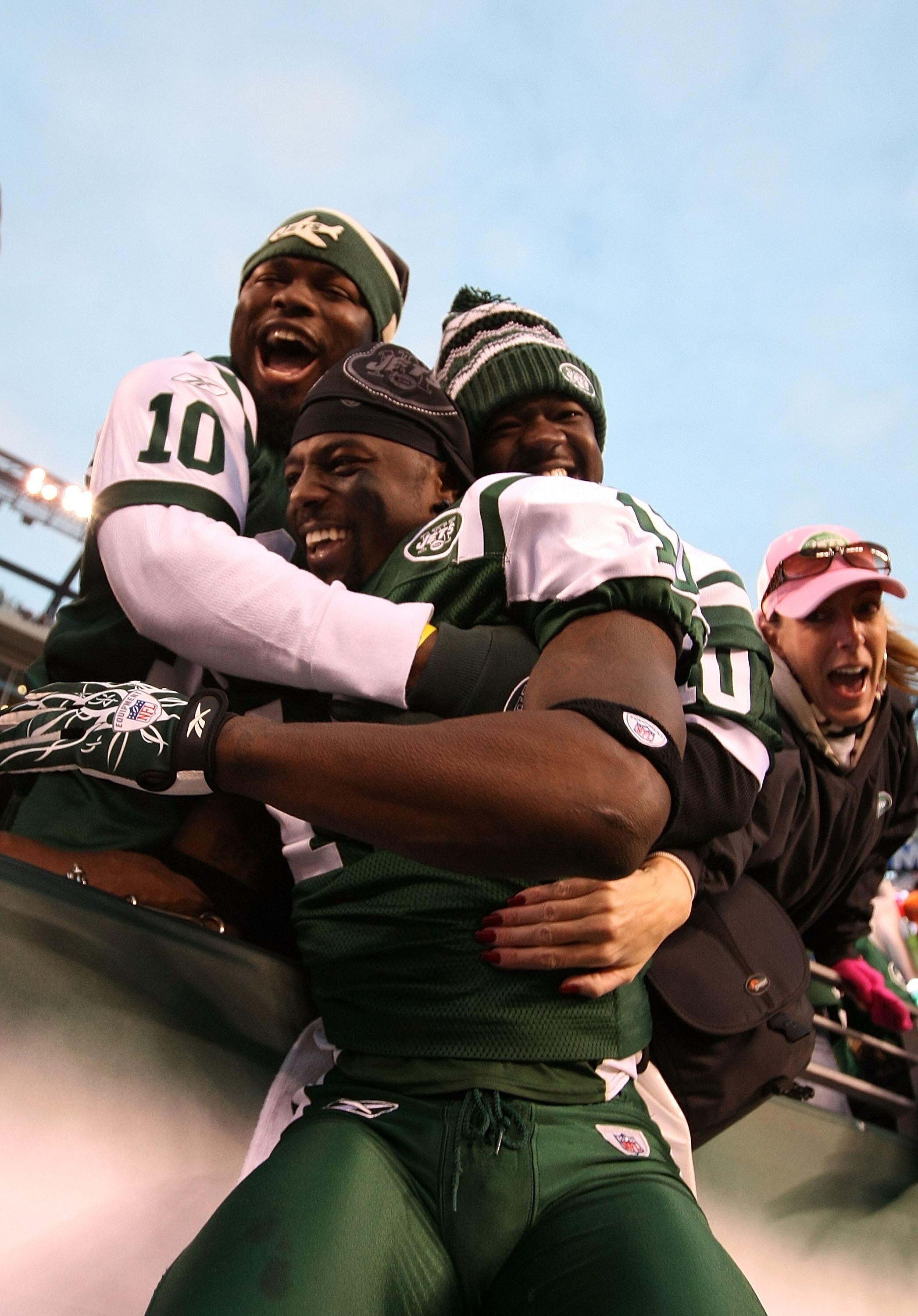 EAST RUTHERFORD, NJ - NOVEMBER 21:  Santonio Holmes #10 of the New York Jets celebrates with fans after scoring the winning  touchdown against  the Houston Texans during the fourth quarter of their  game on November 21, 2010 at the New Meadowlands Stadium