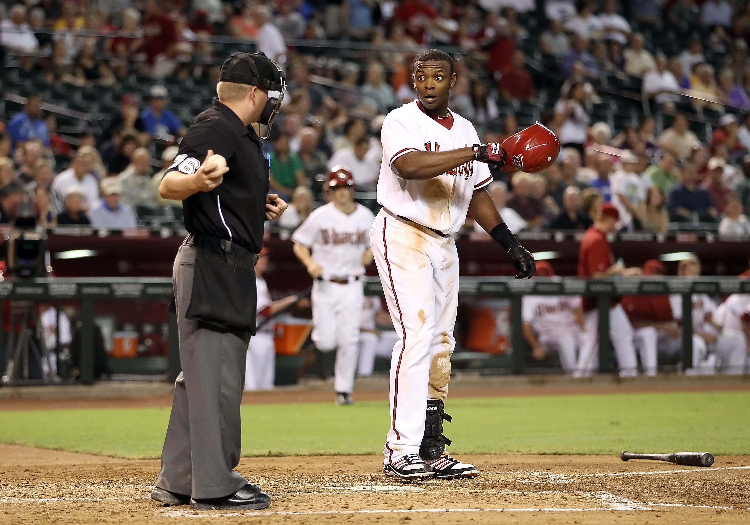 PHOENIX - AUGUST 30:  Justin Upton #24 of the Arizona Diamondbacks reacts after striking out during the Major League Baseball game against the San Diego Padres at Chase Field on August 30, 2010 in Phoenix, Arizona. The Diamondbacks defeated the Padres 7-2