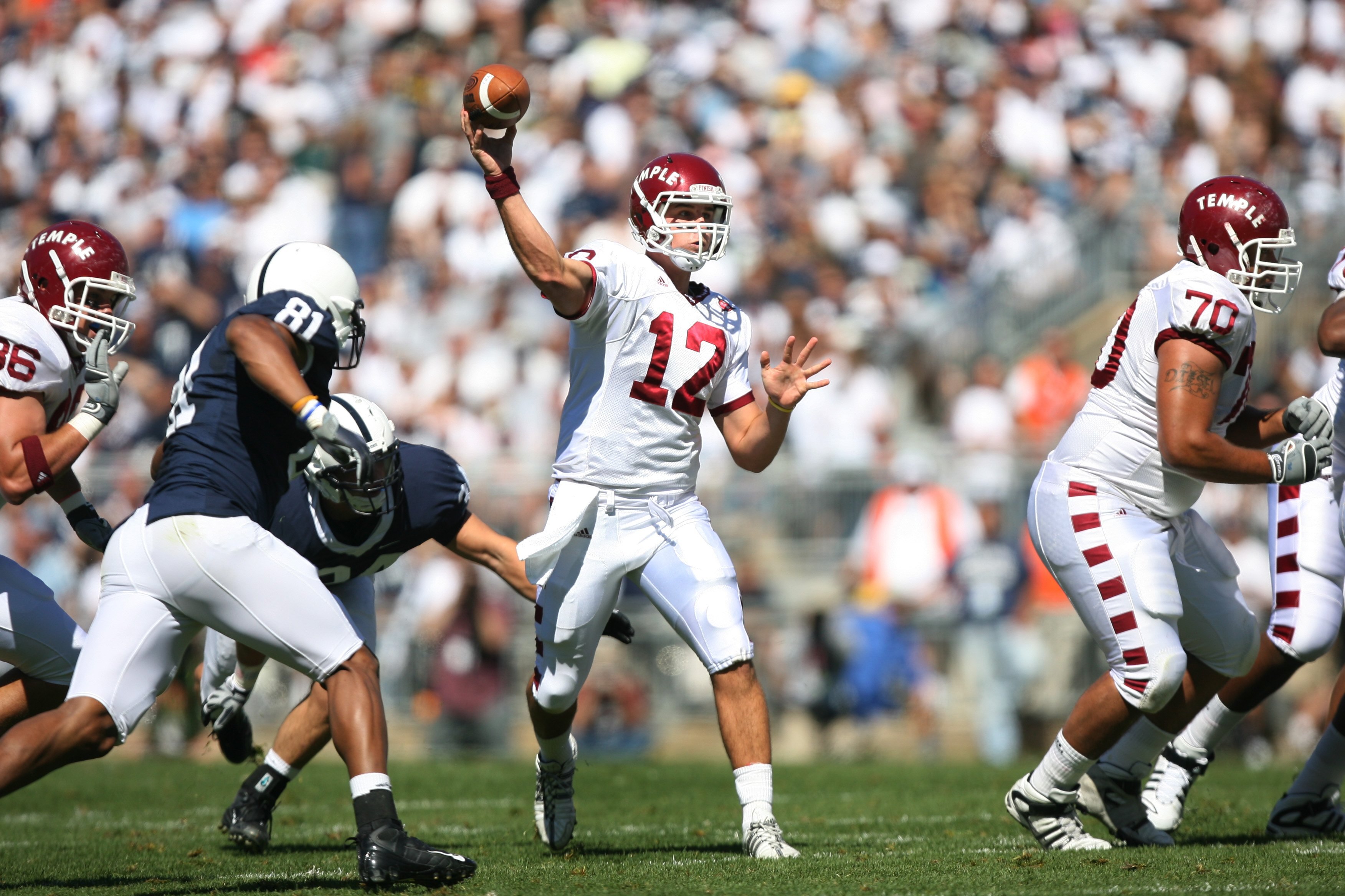 STATE COLLEGE, PA - SEPTEMBER 19: Quarterback Vaughn Charlton #12 of the Temple Owls throws a pass during a game against the Penn State Nittany Lions on September 19, 2009 at Beaver Stadium in State College, Pennsylvania. (Photo by Hunter Martin/Getty Ima