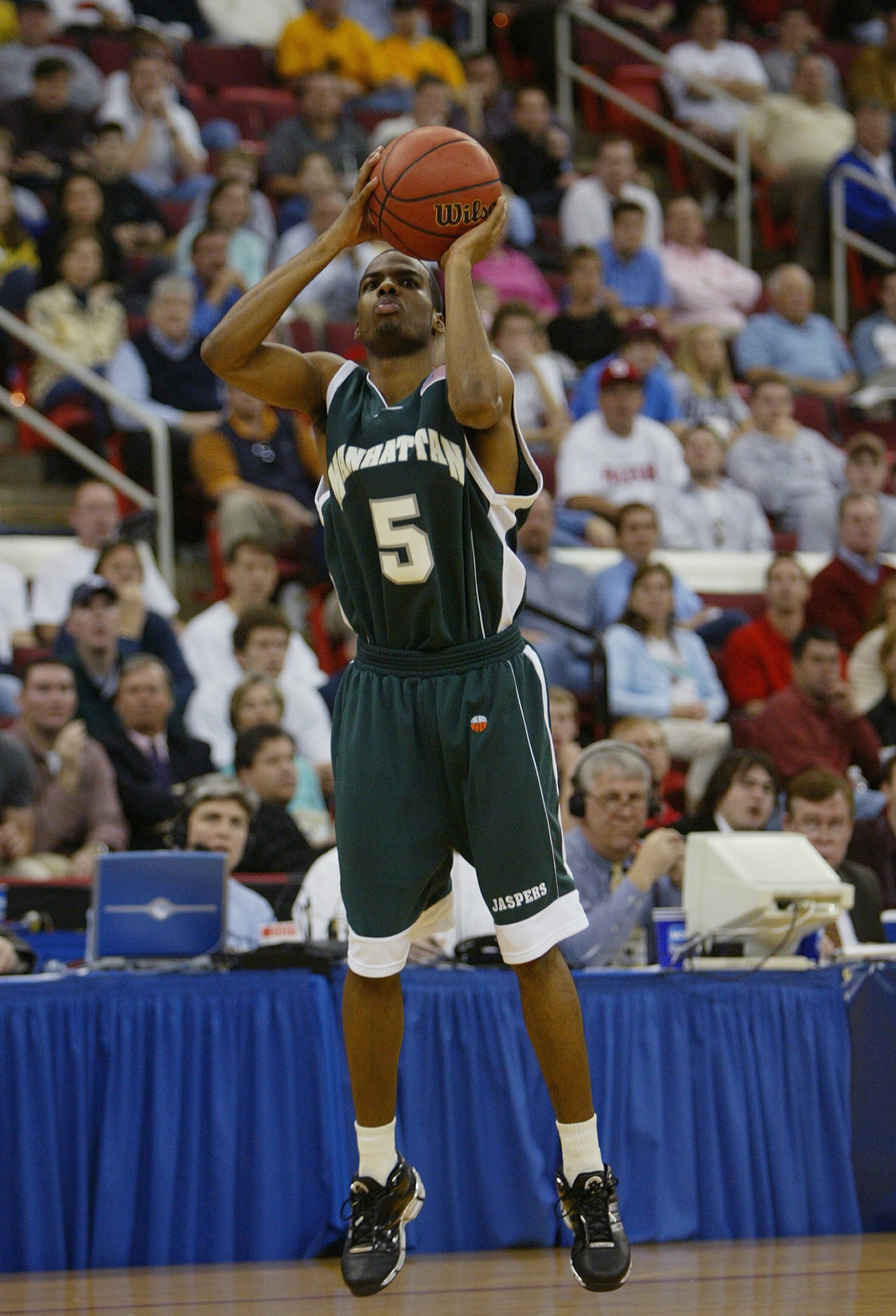 RALEIGH, NC - MARCH 20:  Jason Wingate #5 of the Manhattan Jaspers shoots a jumper during the second round game of the NCAA Division I Men's Basketball Tournament against the Wake Forest Demon Deacons at the RBC Center on March 20, 2004 in Raleigh, North