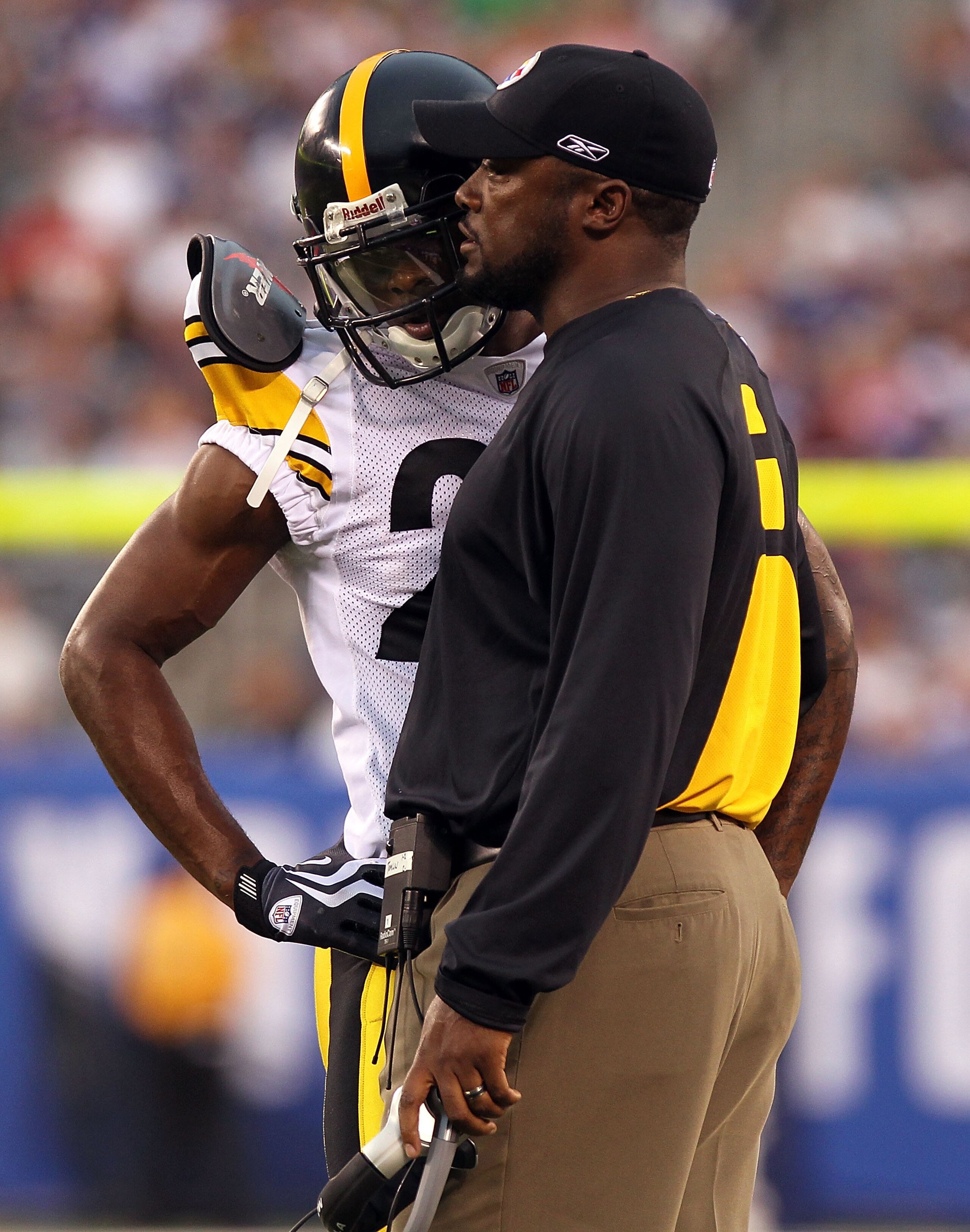 EAST RUTHERFORD, NJ - AUGUST 21: Ike Taylor #24 of the Pittsburgh Steelers talks with head coach Mike Tomlin after being ejected from the game for fighting against the New York Giants during their preseason game at New Meadowlands Stadium on August 21, 2 EAST RUTHERFORD, NJ - AUGUST 21: Ike Taylor #24 of the Pittsburgh Steelers talks with head coach Mike Tomlin after being ejected from the game for fighting against the New York Giants during their preseason game at New Meadowlands Stadium on August 21, 2