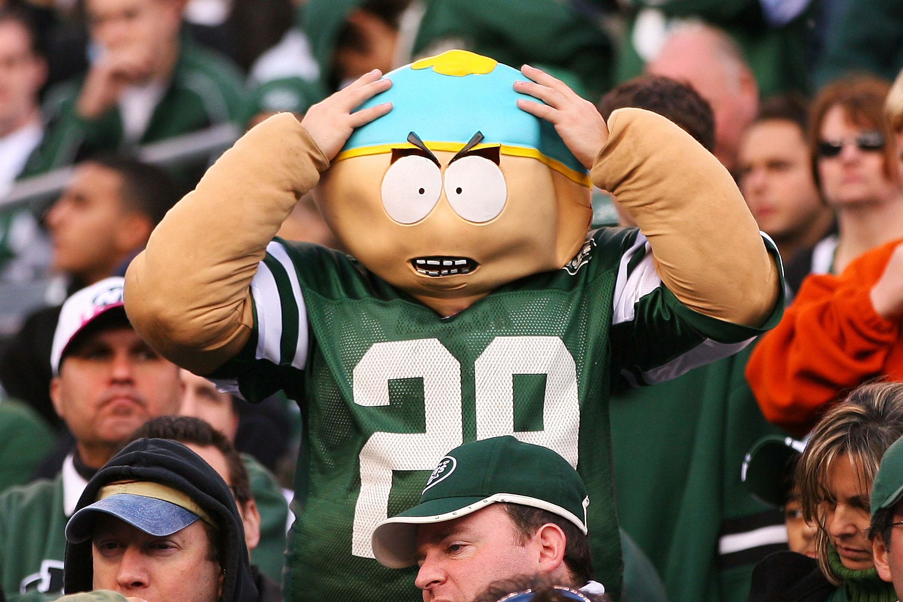 EAST RUTHERFORD, NJ - OCTOBER 31: A Jets fan dressed as Cartman, a character from the television show 'South Park' puts his hands on his head during the fourth quarter of a game against the Green Bay Packers on October 31, 2010 at the New Meadowlands Stad
