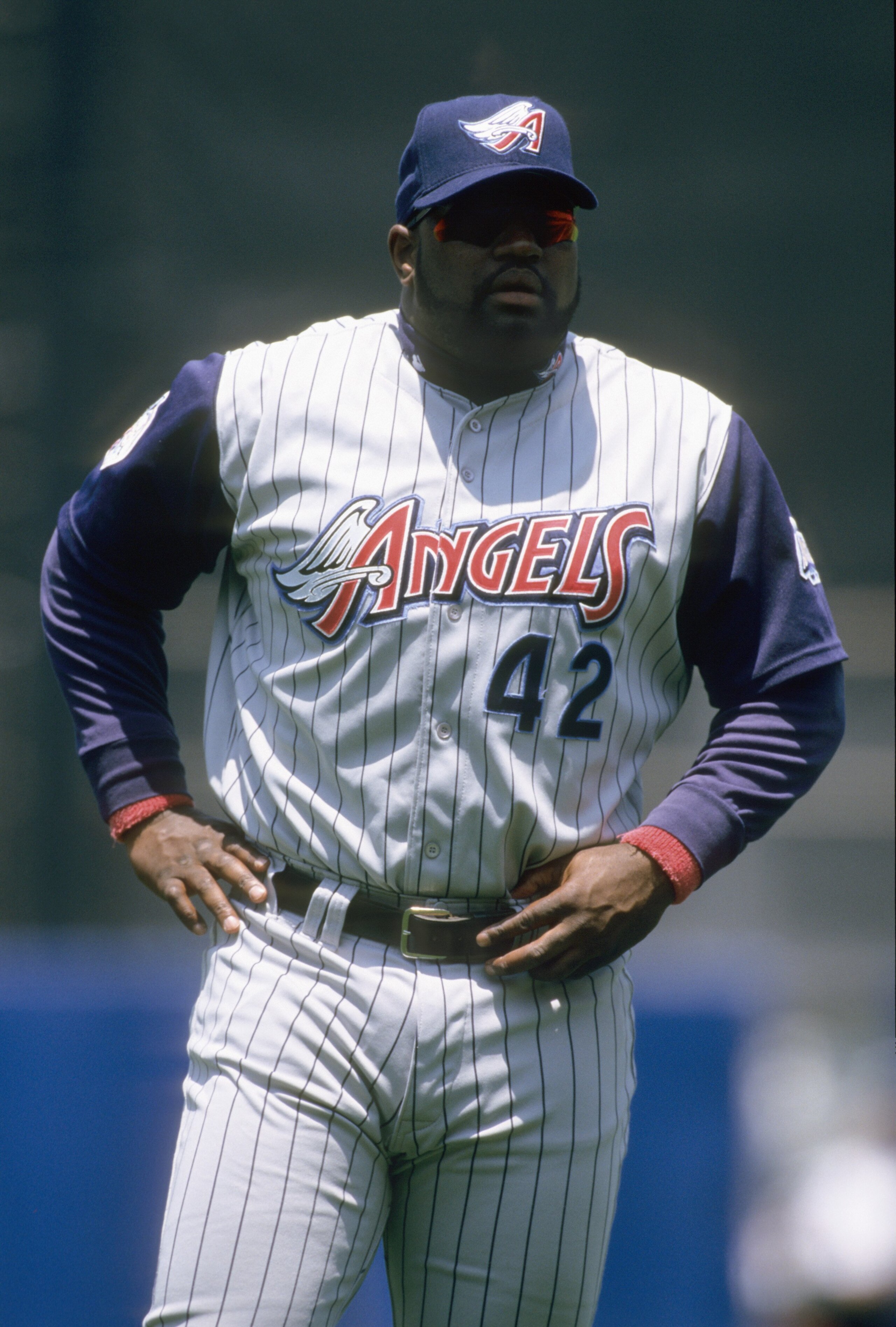 LOS ANGELES - JUNE 5:  Mo Vaughn #42 of the Anaheim Angels looks on during the game against the Los Angeles Dodgers at Dodger Stadium on June 5, 1999 in Los Angeles, California. (Photo by Tom Hauck/Getty Images)