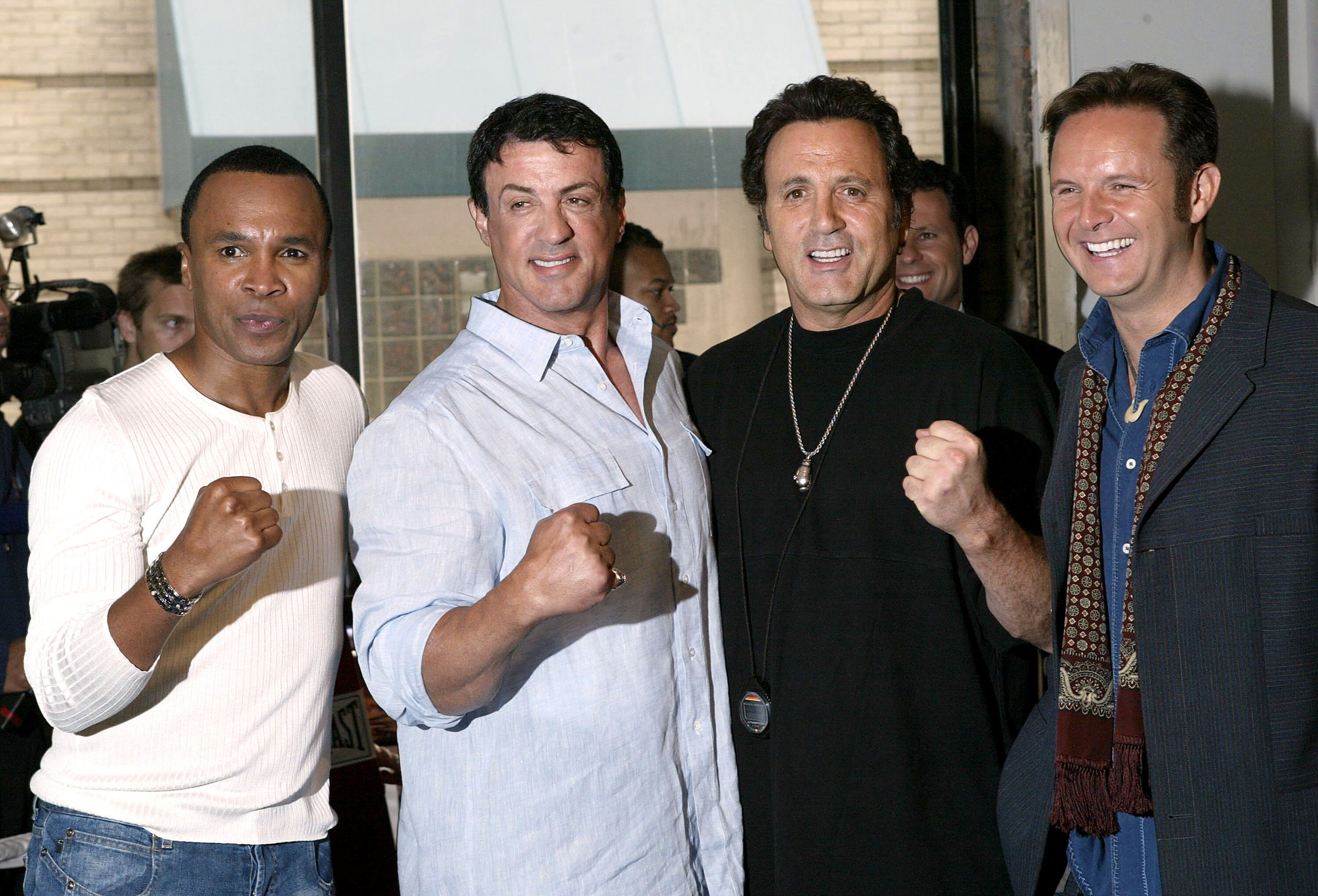 NEW YORK - MAY 17:  (L-R) Boxer Sugar Ray Leonard, actor Sylvester Stallone, Frank Stallone and producer Mark Burnett pose for a photo during a casting call for the new NBC unscripted drama 'The Contender' at the Trinity boxing club on May 17, 2004 in New