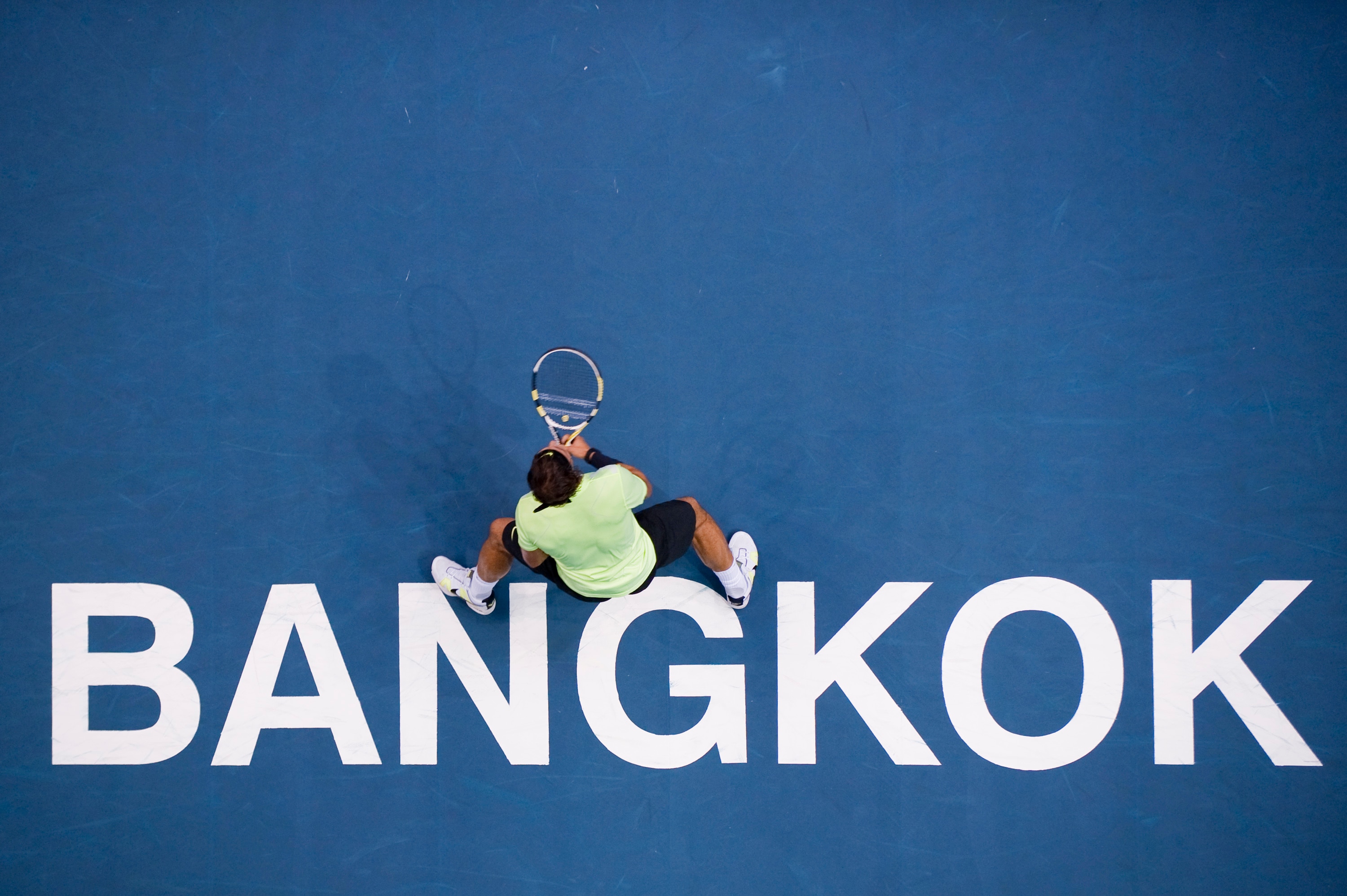 BANGKOK, THAILAND - OCTOBER 02:  Rafael Nadal of Spain in action during his match against compatriot Guillermo Garcia-Lopez during the Day 8 of the PTT Thailand Open at Impact Arena on October 2, 2010 in Bangkok, Thailand.  (Photo by Victor Fraile/Getty I