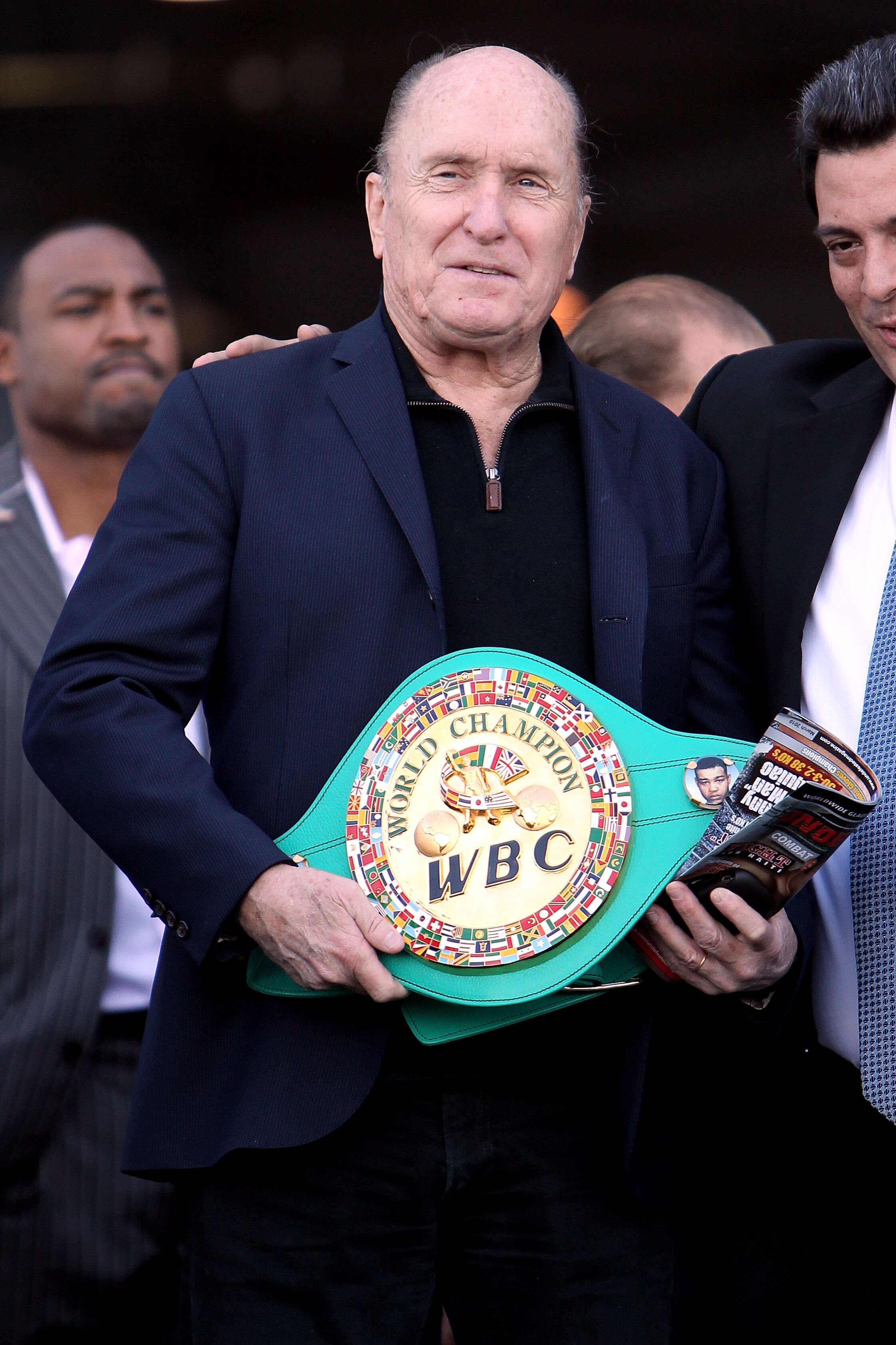 ARLINGTON, TX - MARCH 12:  Actor Robert Duvall poses in front of Cowboys Stadium with a belt before the weigh-in for the WBO welterweight title fight between Manny Pacquiao of the Philippines and Joshua Clottey of Ghana on March 12, 2010 in Arlington, Tex