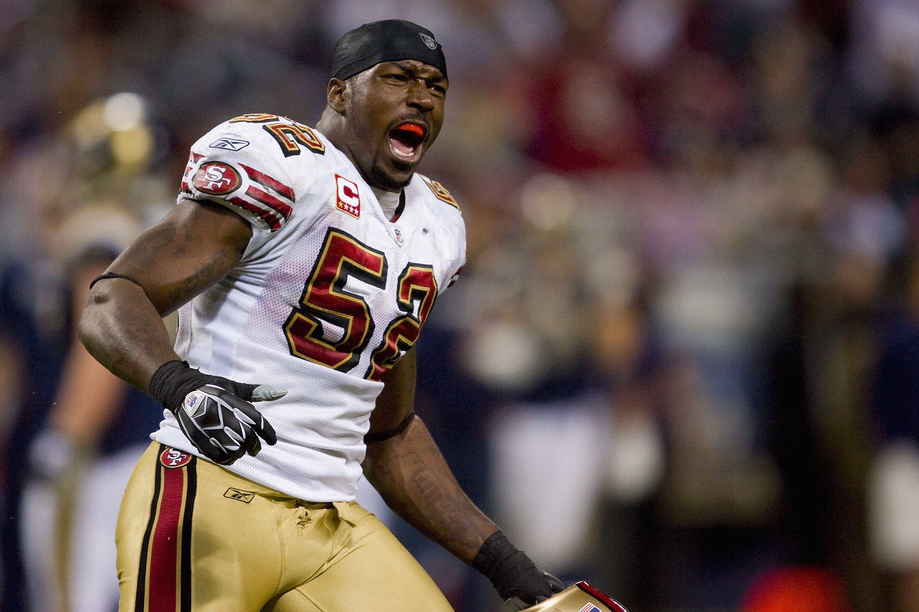 ST. LOUIS, MO - DECEMBER 21: Patrick Willis #52 of the San Francisco 49ers celebrates a victory against the St. Louis Rams at the Edward Jones Dome on December 21, 2008 in St. Louis, Missouri.  The 49ers beat the Rams 17-16.  (Photo by Dilip Vishwanat/Get