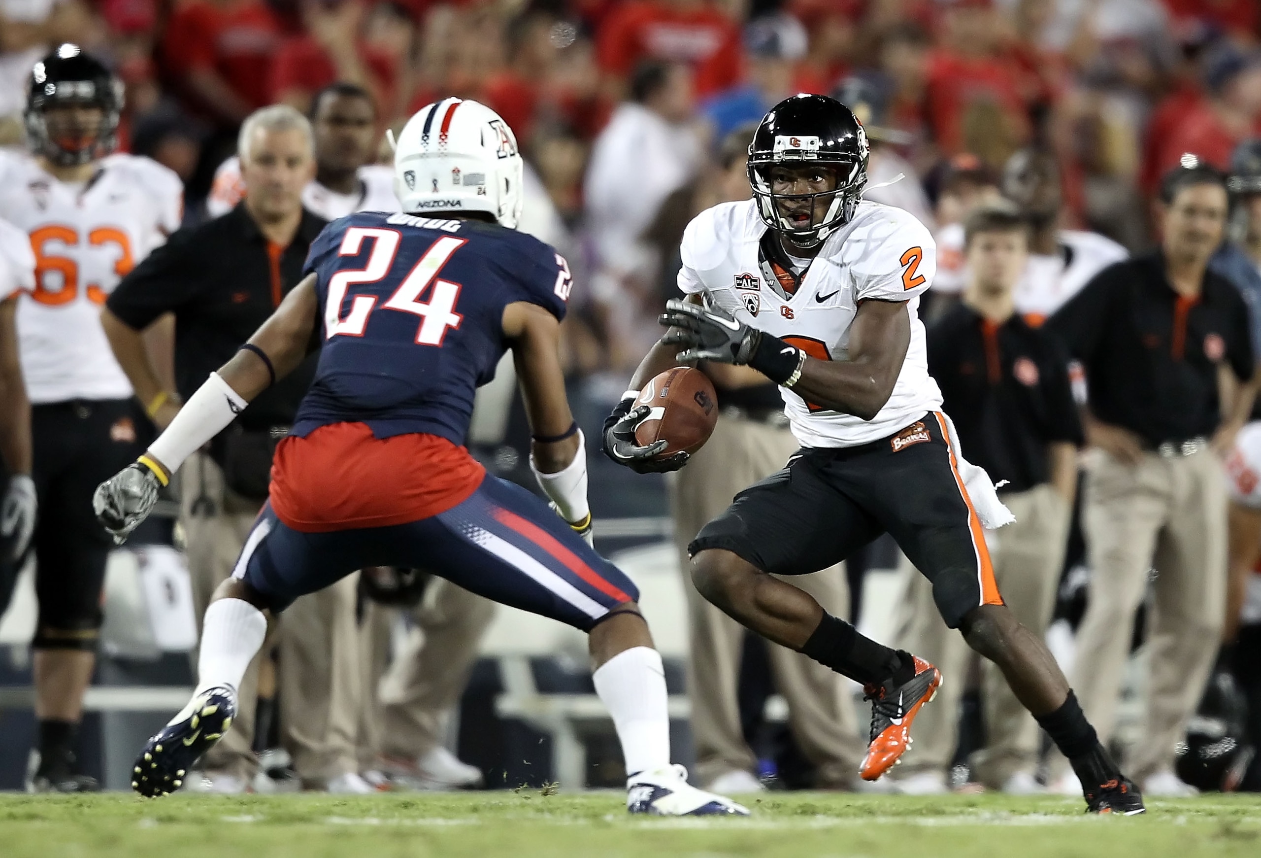 TUCSON, AZ - OCTOBER 09: Wide receiver Markus Wheaton #2 of the Oregon State Beavers runs with the football after a 6 yard reception against the Arizona Wildcats during the college football game at Arizona Stadium on October 9, 2010 in Tucson, Arizona. TUCSON, AZ - OCTOBER 09: Wide receiver Markus Wheaton #2 of the Oregon State Beavers runs with the football after a 6 yard reception against the Arizona Wildcats during the college football game at Arizona Stadium on October 9, 2010 in Tucson, Arizona.