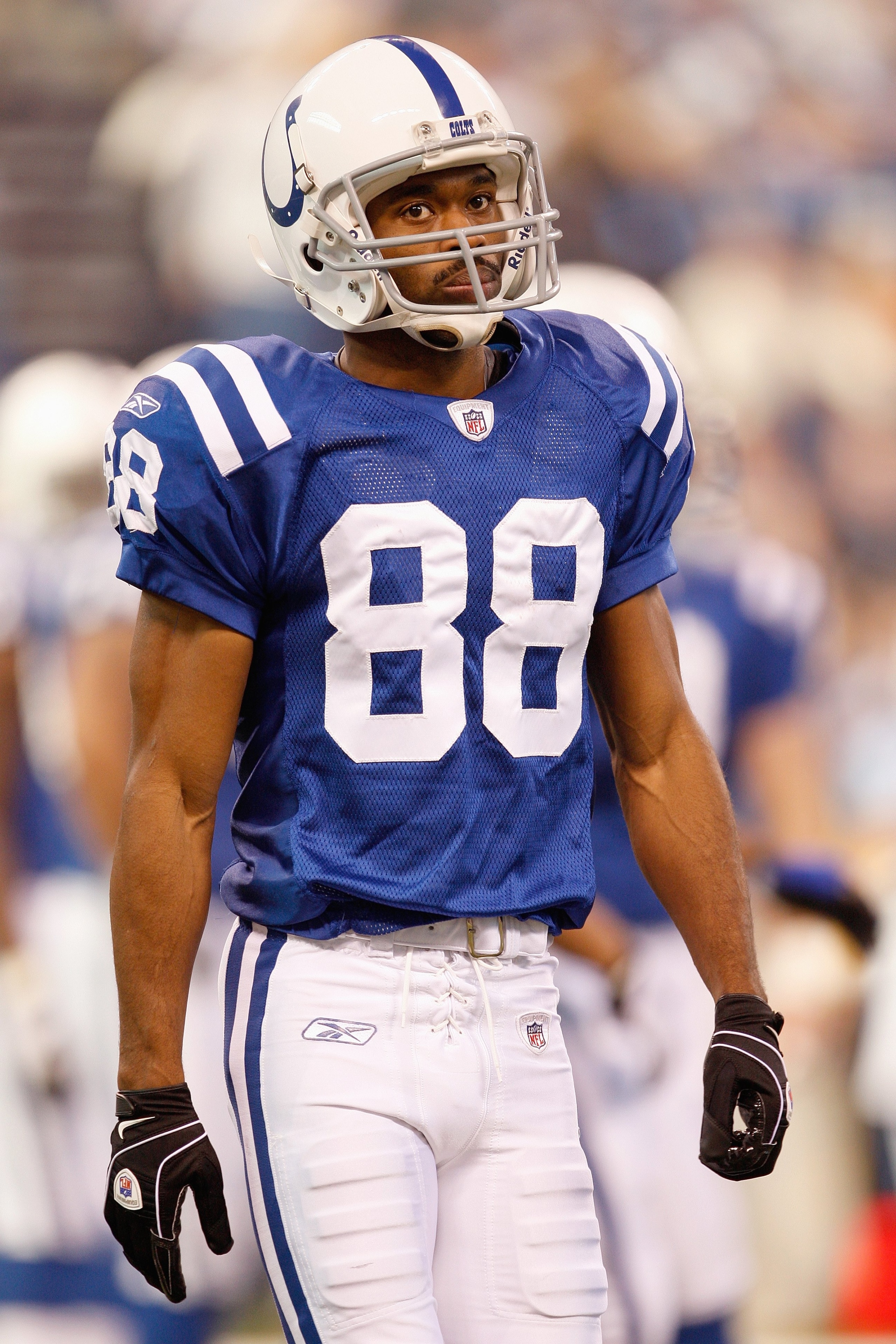 INDIANAPOLIS - DECEMBER 28:  Marvin Harrison #88 of the Indianapolis Colts walks on the field during the game against the Tennessee Titans on December 28, 2008 at Lucas Oil Stadium in Indianapolis, Indiana. (Photo by: Jamie Squire/Getty Images)