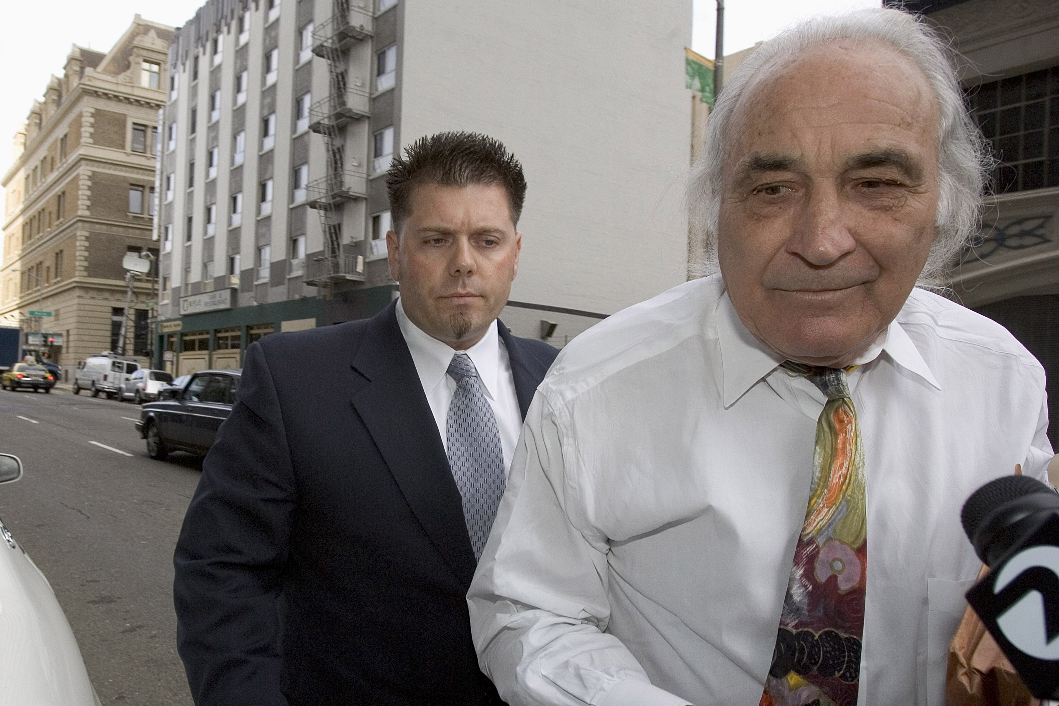 SAN FRANCISCO, CA -OCTOBER 18:  Greg Anderson (L) who was Barry Bonds trainer arrives at the Federal Courthouse with his attorney Tony Serra for his sentencing in the Balco steroid case on October 18, 2005 in San Francisco, California. The case which brou