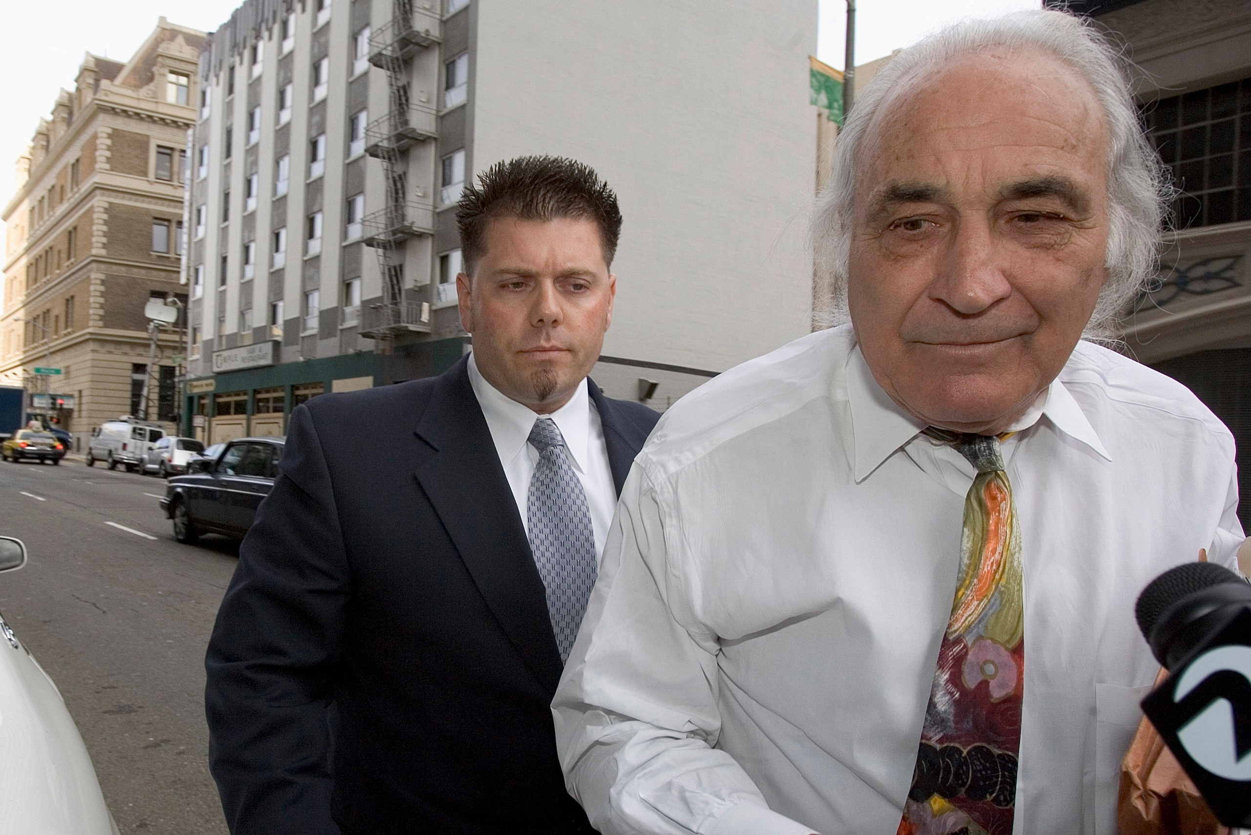 SAN FRANCISCO, CA -OCTOBER 18:  Greg Anderson (L) who was Barry Bonds trainer arrives at the Federal Courthouse with his attorney Tony Serra for his sentencing in the Balco steroid case on October 18, 2005 in San Francisco, California. The case which brou