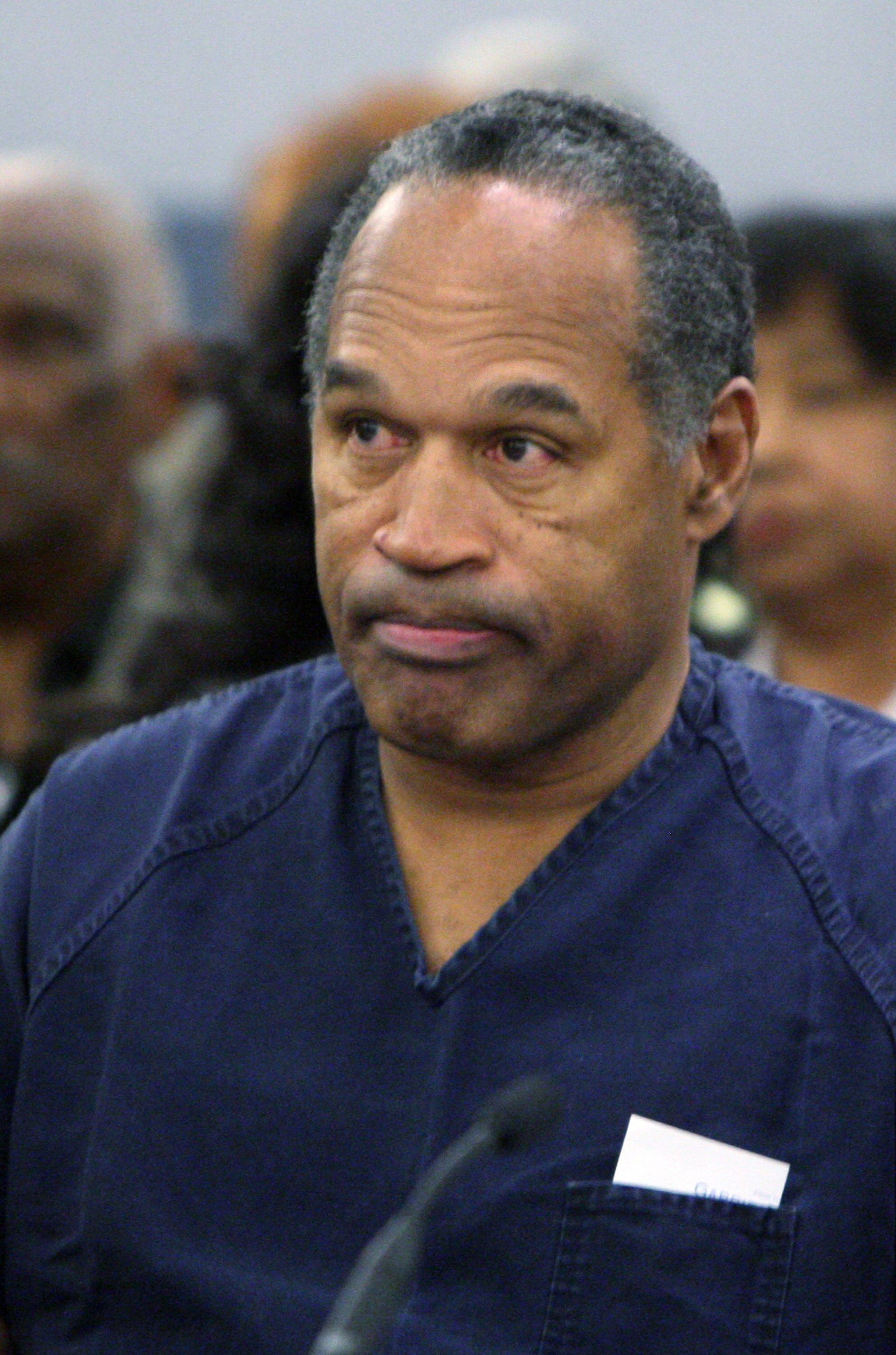 LAS VEGAS - DECEMBER 5:  OJ Simpson listens to District Court Judge Jackie Glass prior to sentencing at the Clark County Regional Justice Center December 5, 2008 in Las Vegas, Nevada.  Simpson and co-defendant Clarence 'C.J.' Stewart were sentenced on 12