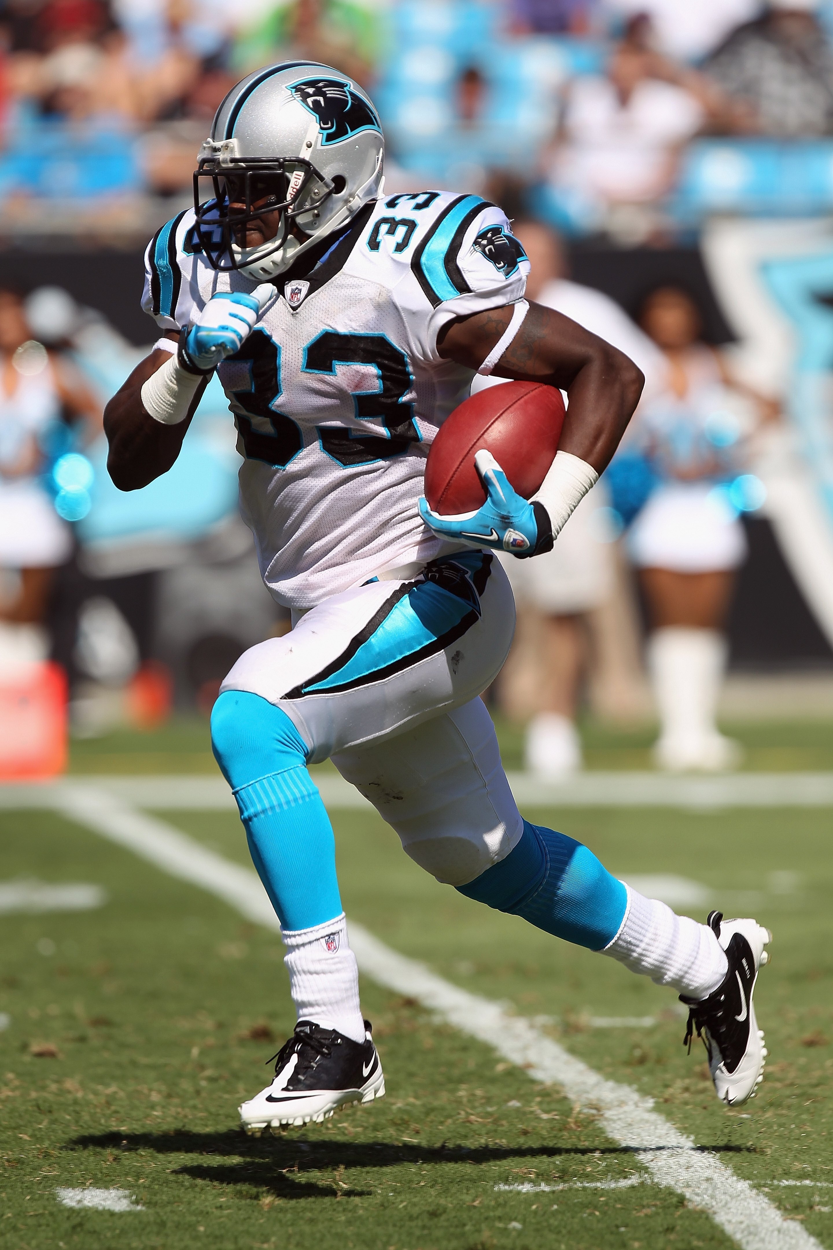 CHARLOTTE, NC - SEPTEMBER 19:  Mike Goodson #33 of the Carolina Panthers during their game at Bank of America Stadium on September 19, 2010 in Charlotte, North Carolina.  (Photo by Streeter Lecka/Getty Images)