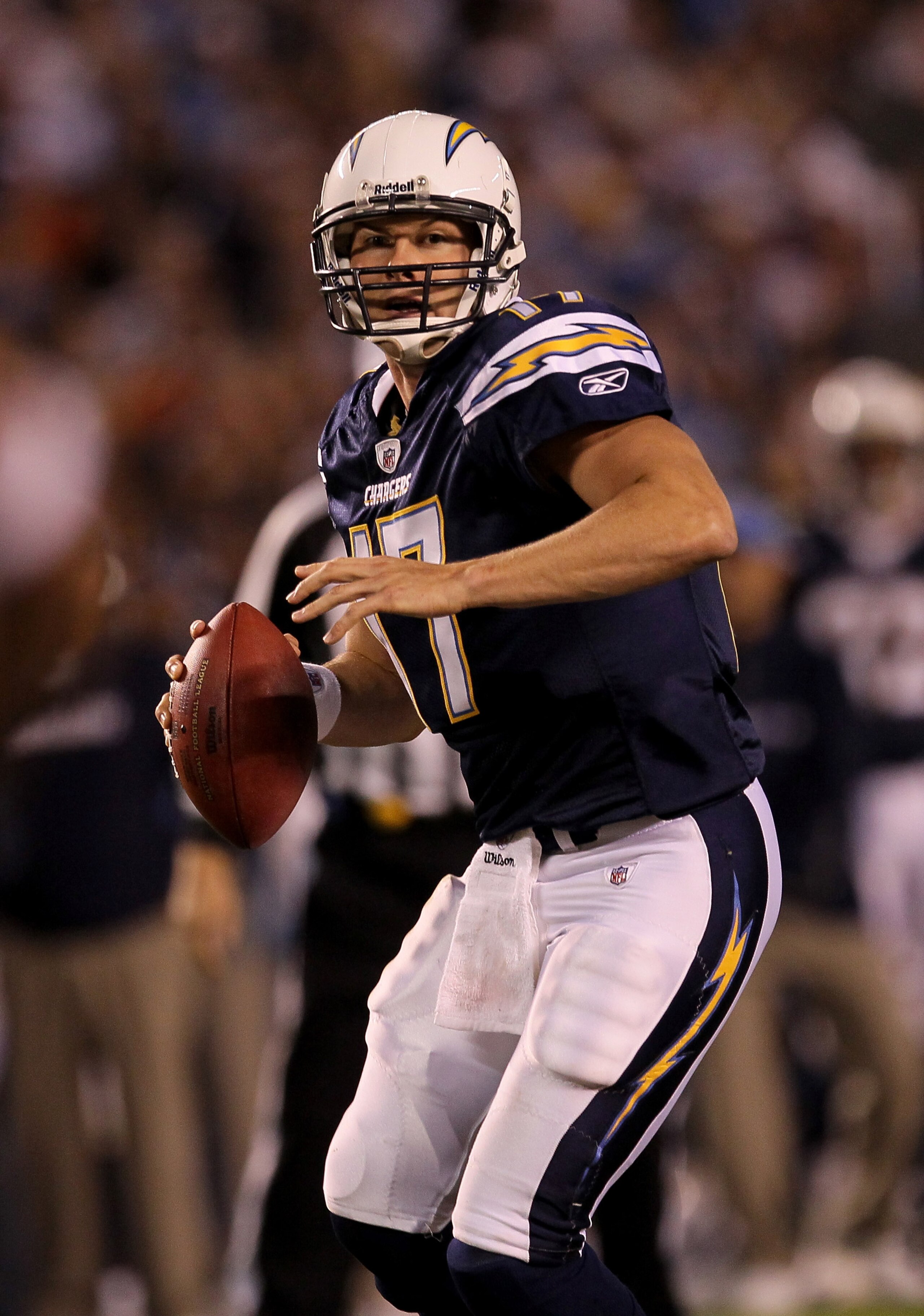 SAN DIEGO - NOVEMBER 22:  Quarterback Philip Rivers #17 of the San Diego Chargers winds up to throw a six yard  touchdown pass to wide receiver Malcom Floyd in the first quarter against the Denver Broncos at Qualcomm Stadium on November 22, 2010 in San Di